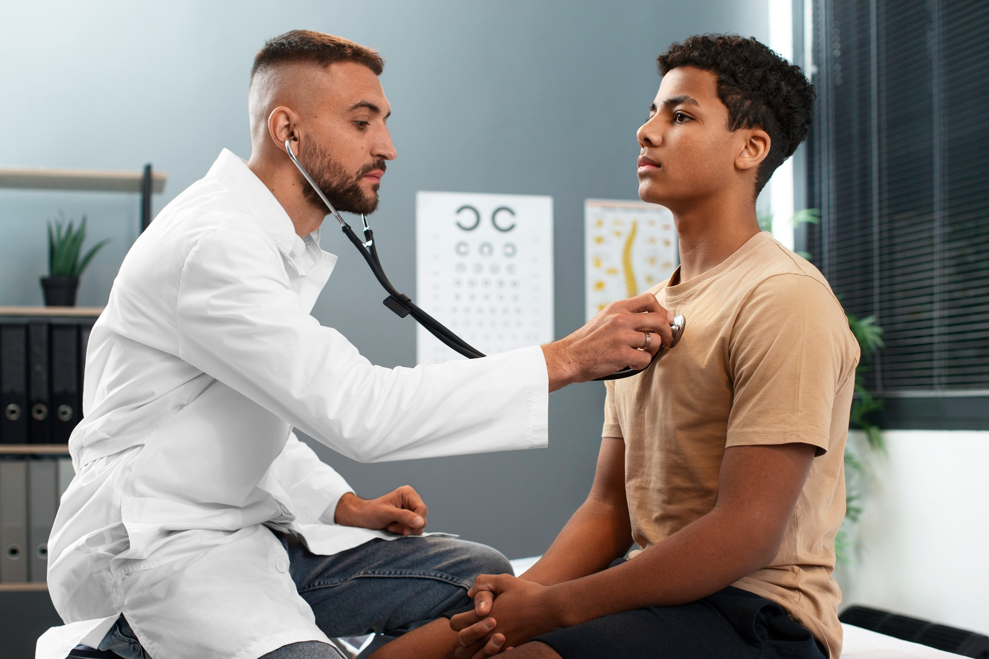 A doctor using a stethoscope to check a patient’s heartbeat, representing medical evaluation for heart palpitations.