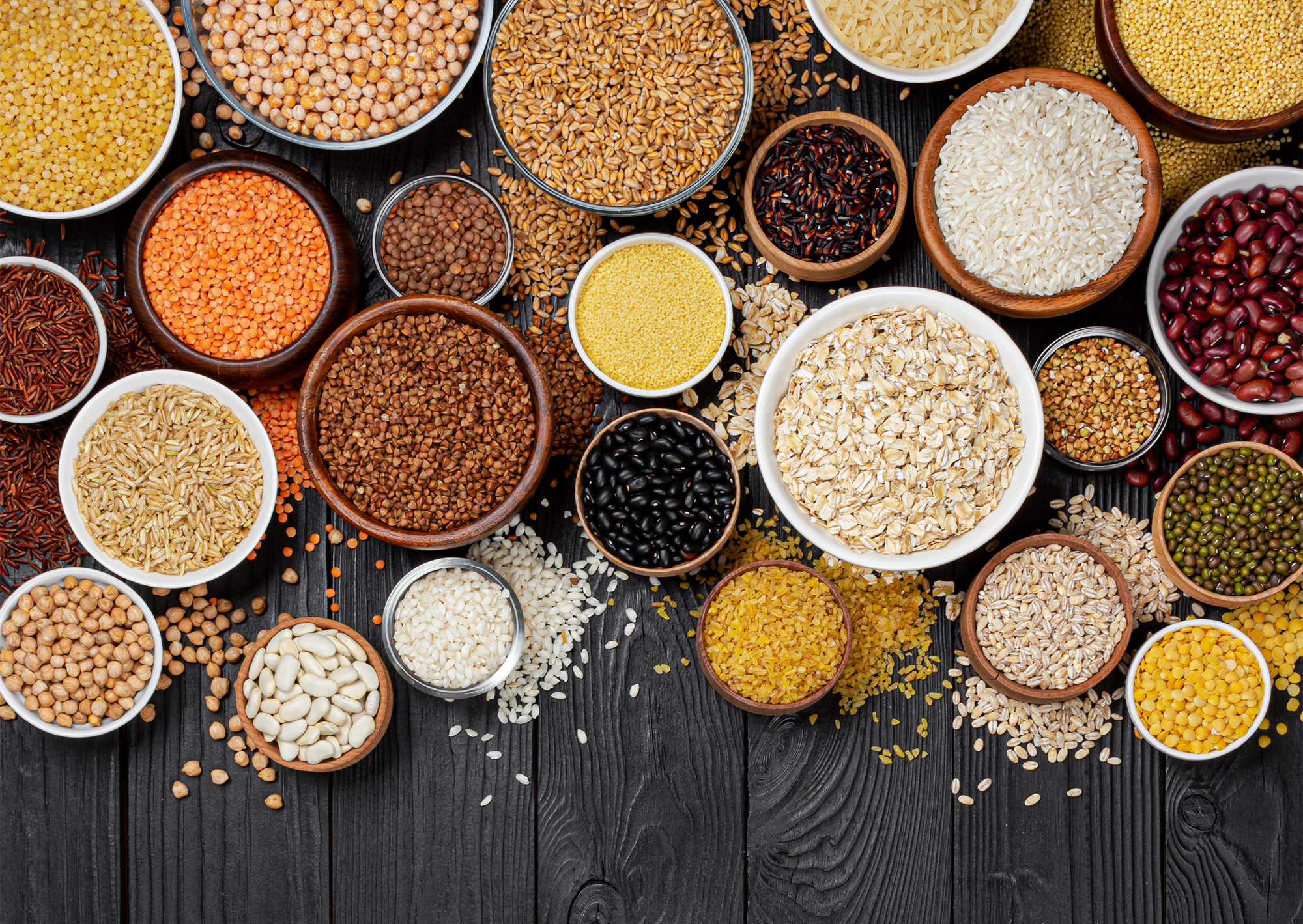 Healthy whole grains such as quinoa, oats, brown rice and barley which are rich sources of fiber and nutrients for a balanced diet with superfoods.