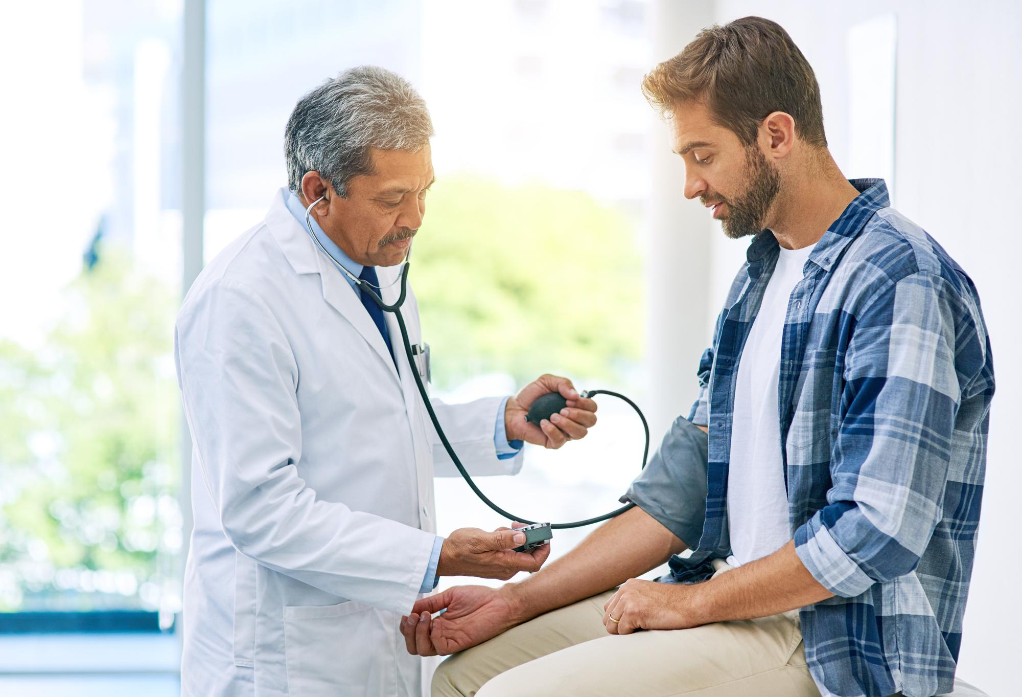 A doctor examines a patient during a routine check-up, using medical tools and maintaining a calm and professional environment.