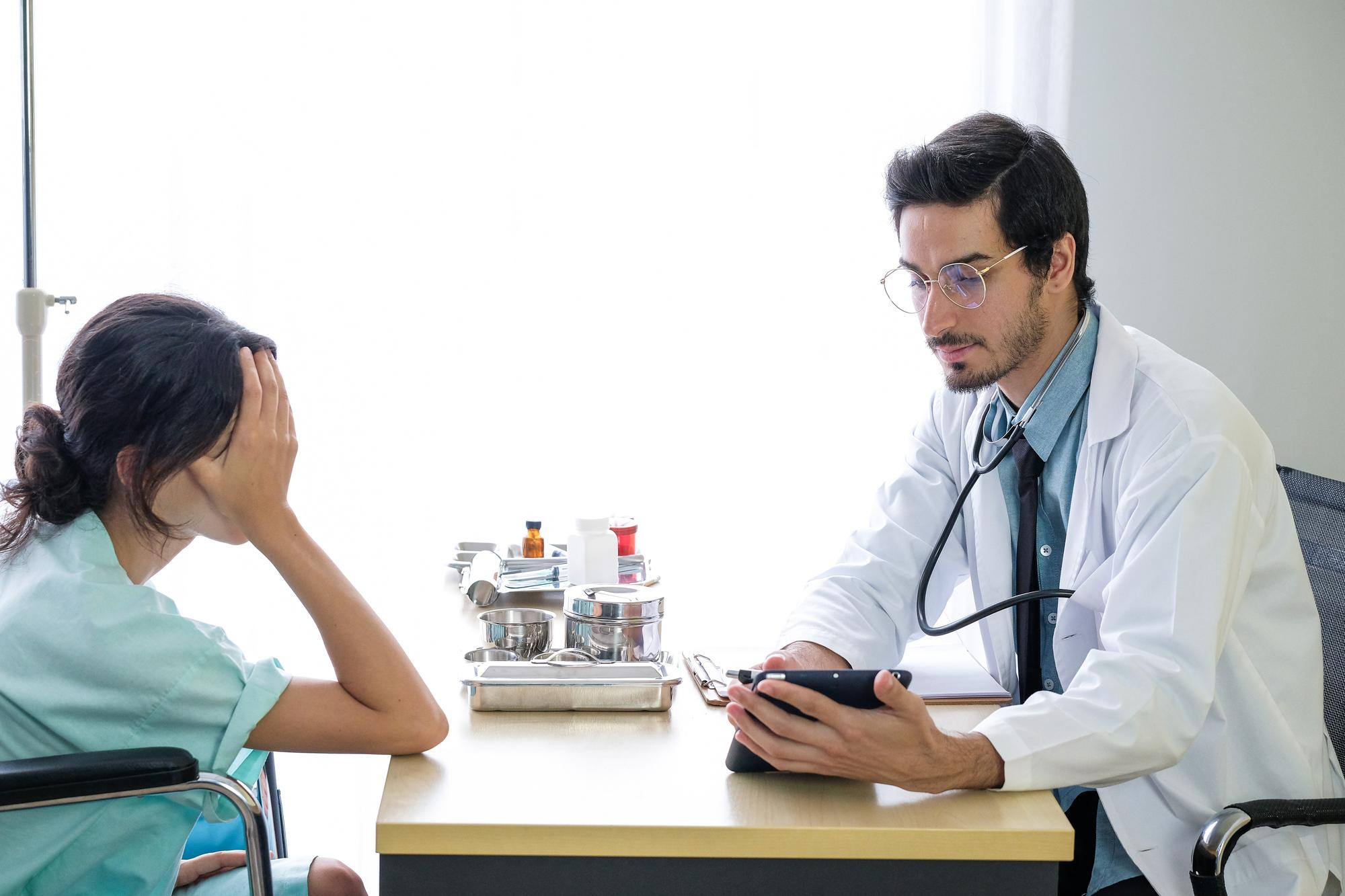 A doctor writing a prescription for a patient with fever, representing medical consultation, proper diagnosis, and safe treatment for fever management.
