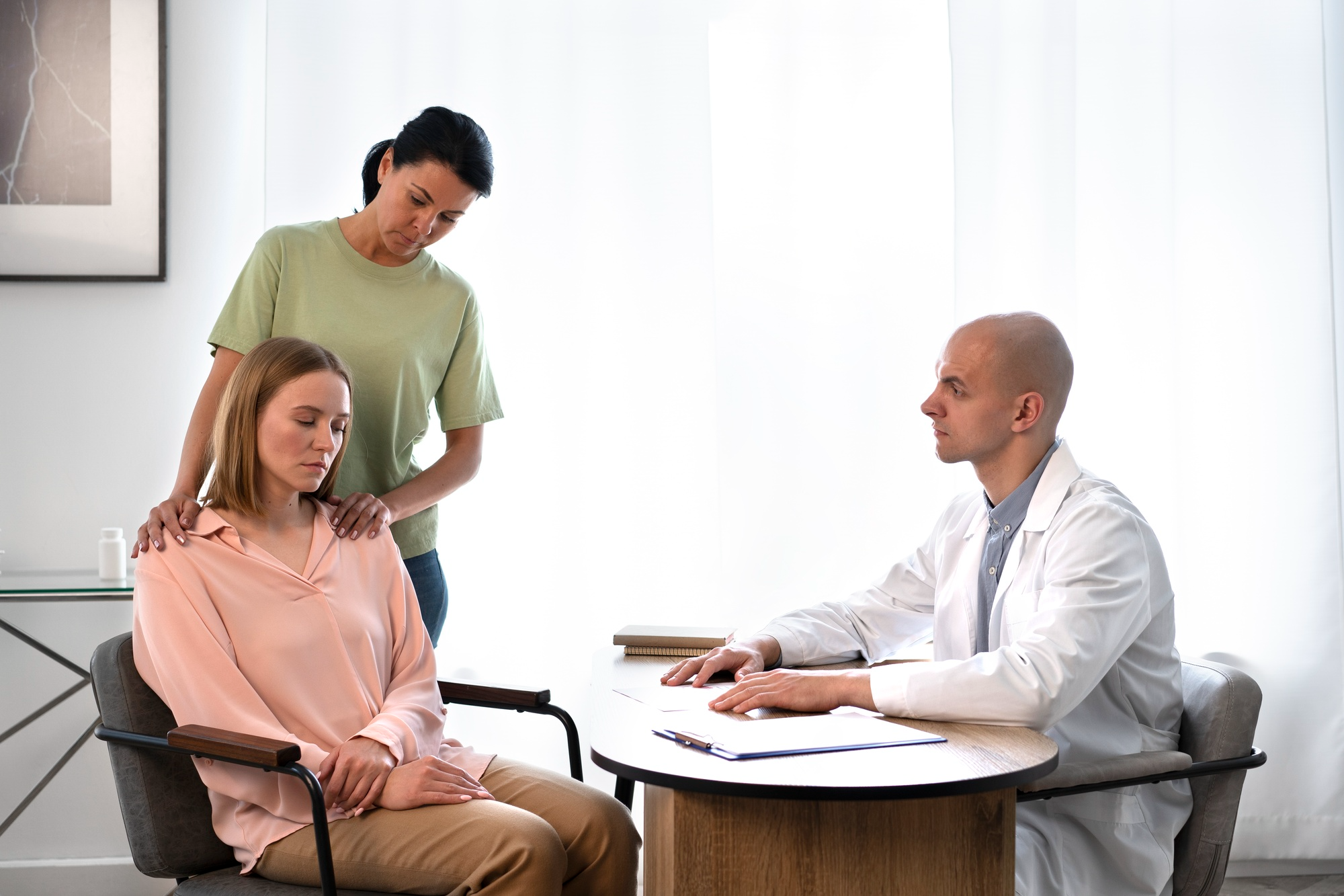 Woman consulting a doctor for stress and anxiety-related issues.