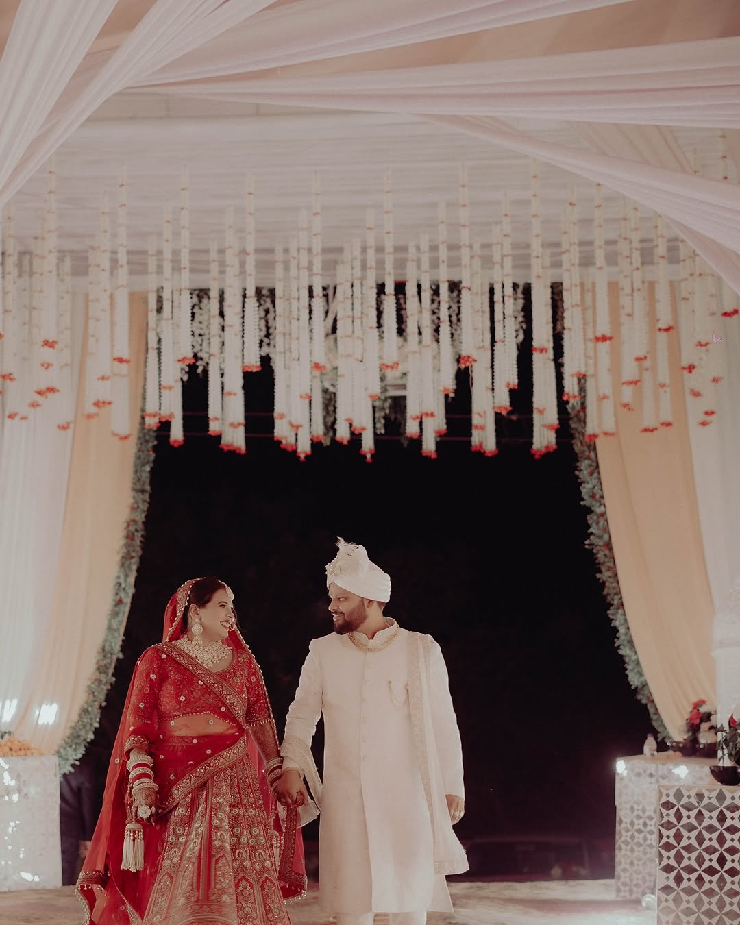 A beautiful shot of the couple during their wedding ceremony.