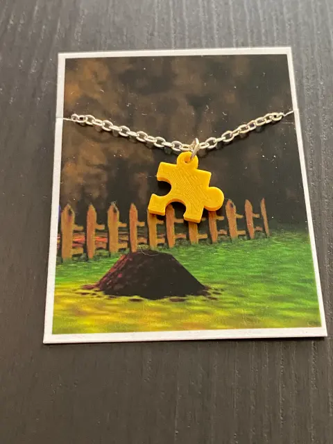 Banjo-Kazooie Jiggy Necklace | Retro Video Game Jewelry | N64 Fan Gift | Gold Jiggy Charm | Geeky Gamer Accessory | 90s Gaming Collectible