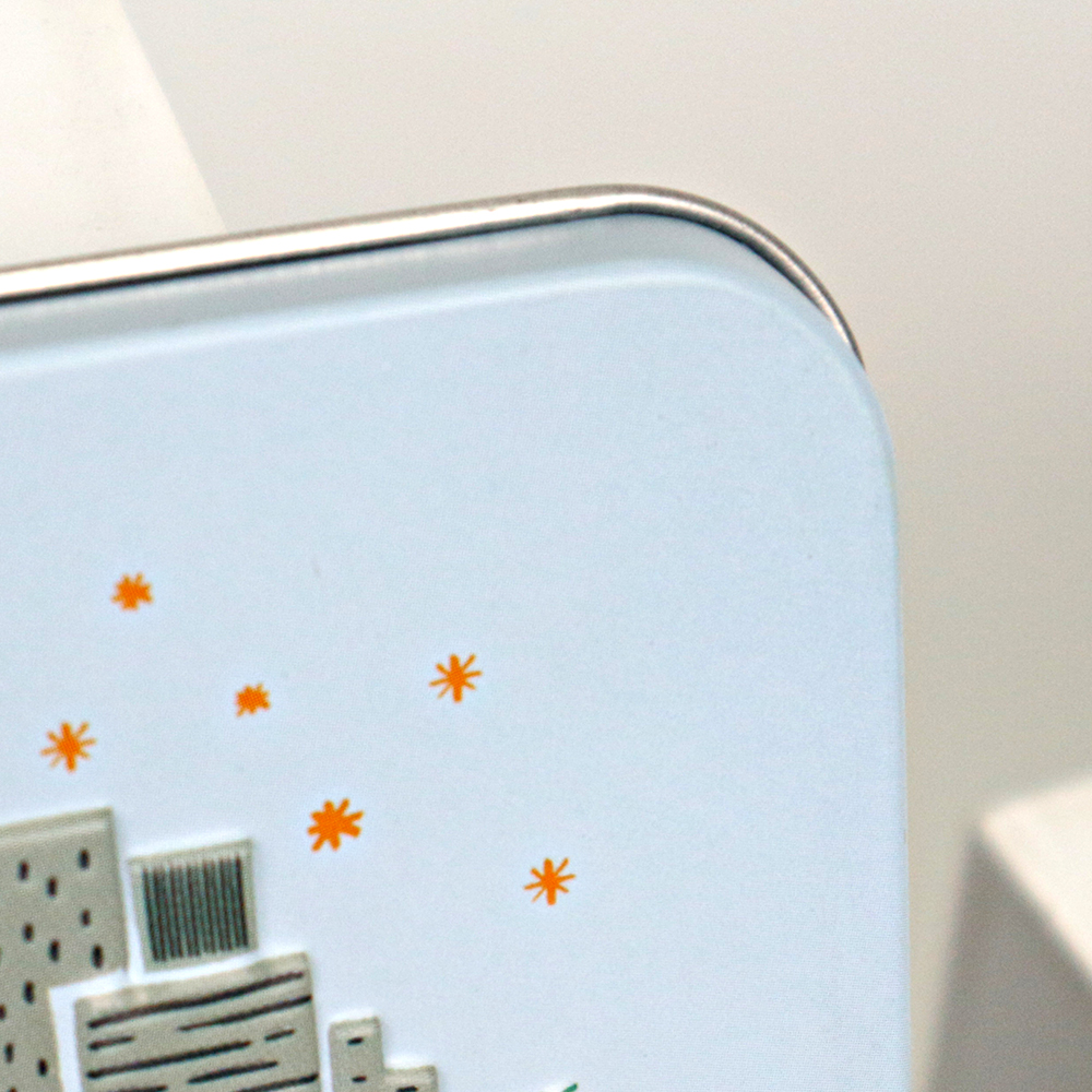 Chocolate rectangular tin box with slip lid on white background