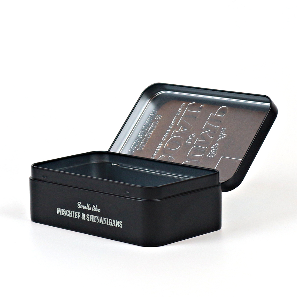 Embossed tin box featuring a classic design and hinge