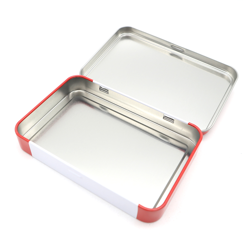 Stylish metal hinge top tin box designed for storing a cosmetic brush set with elegant finish.