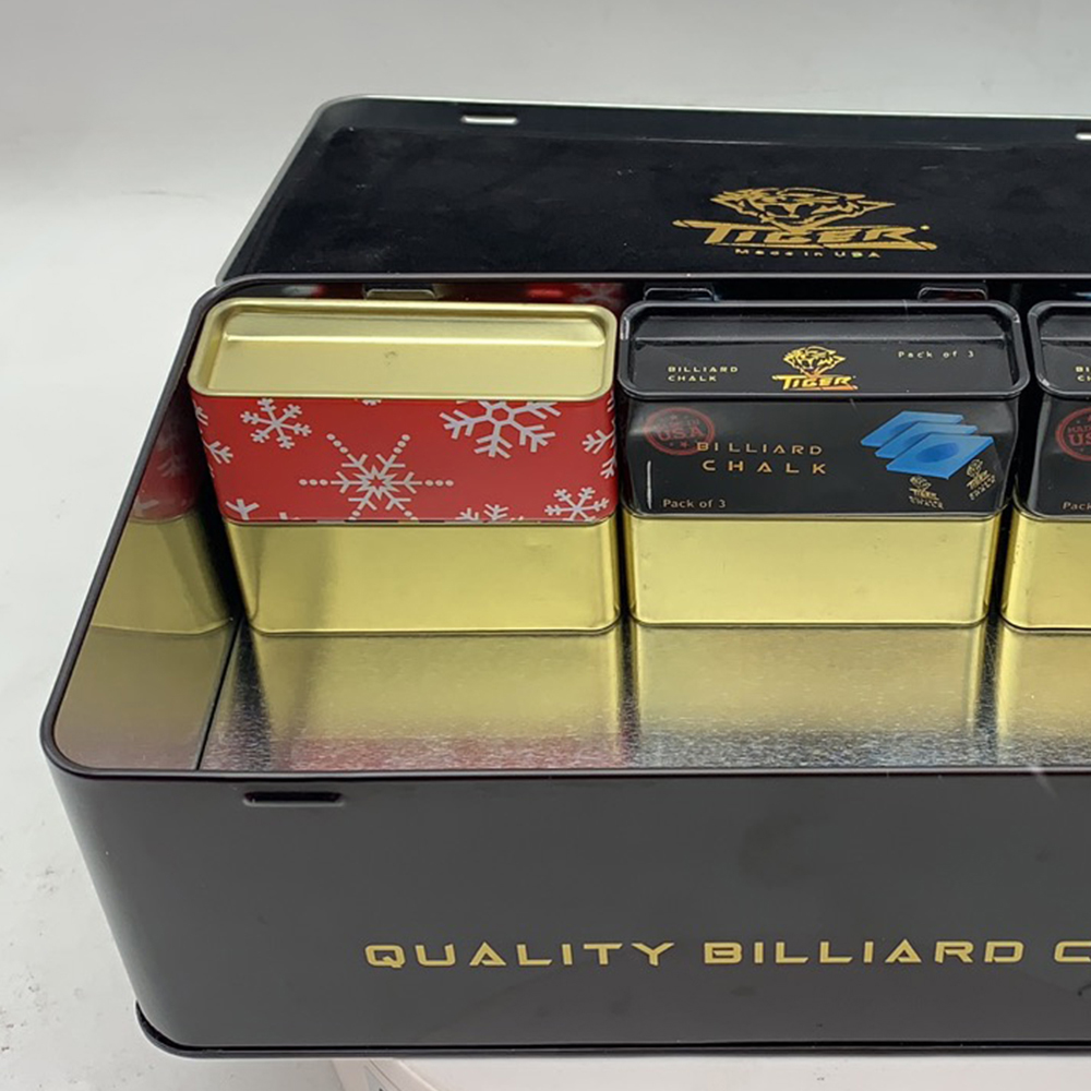 Close-up view of a gift tin box for billiard chalk set.