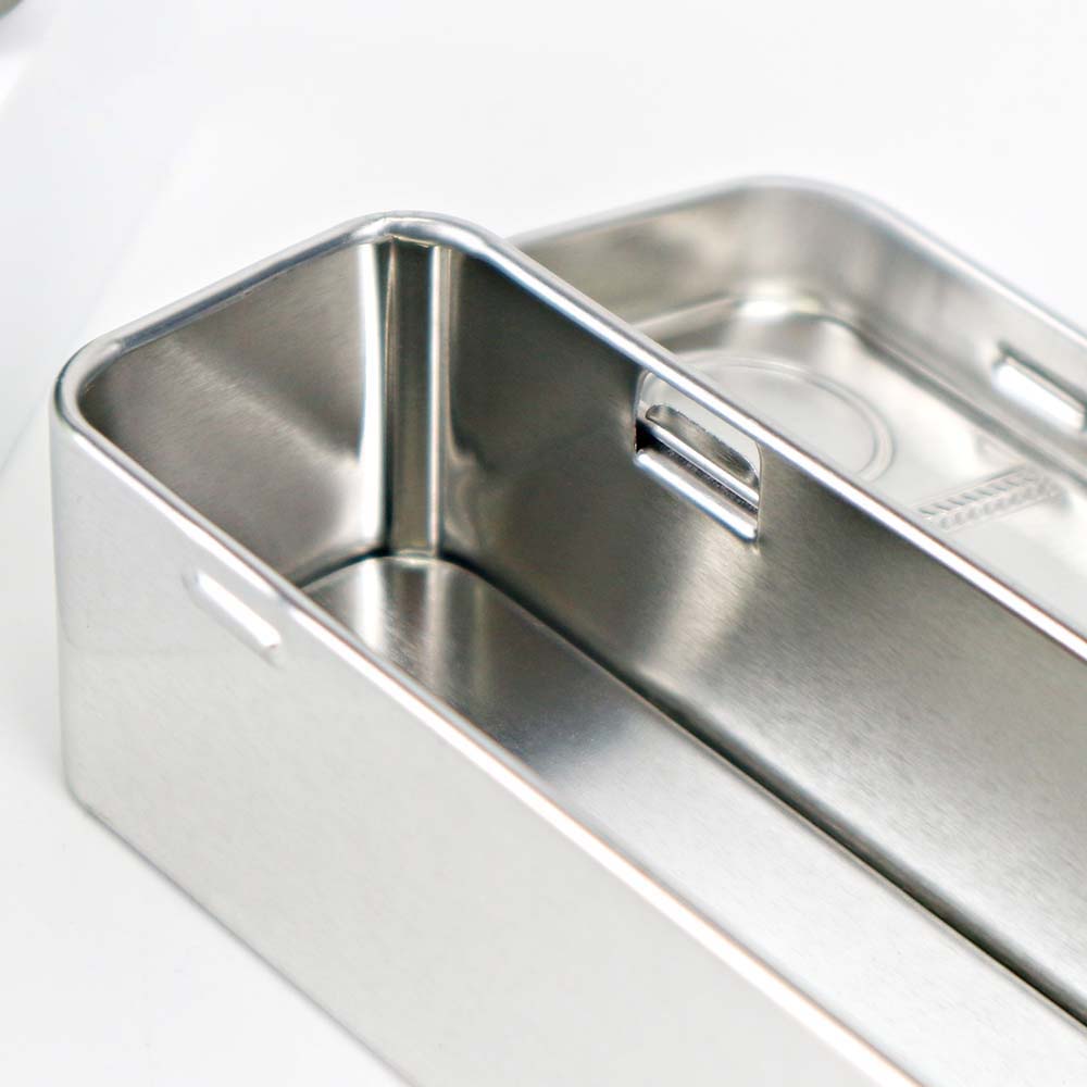 Opened rectangular metal spoon tin box with hinged lid, perfect for organizing spoons or small kitchen items in a neat manner.