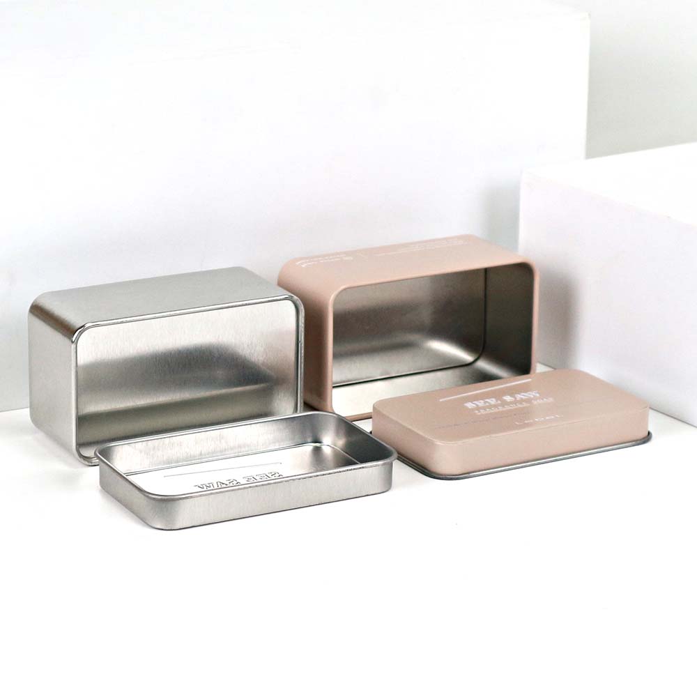 Close-up view of a rectangular metal fragrance soap tin container, highlighting its smooth finish and secure lid for soap preservation.