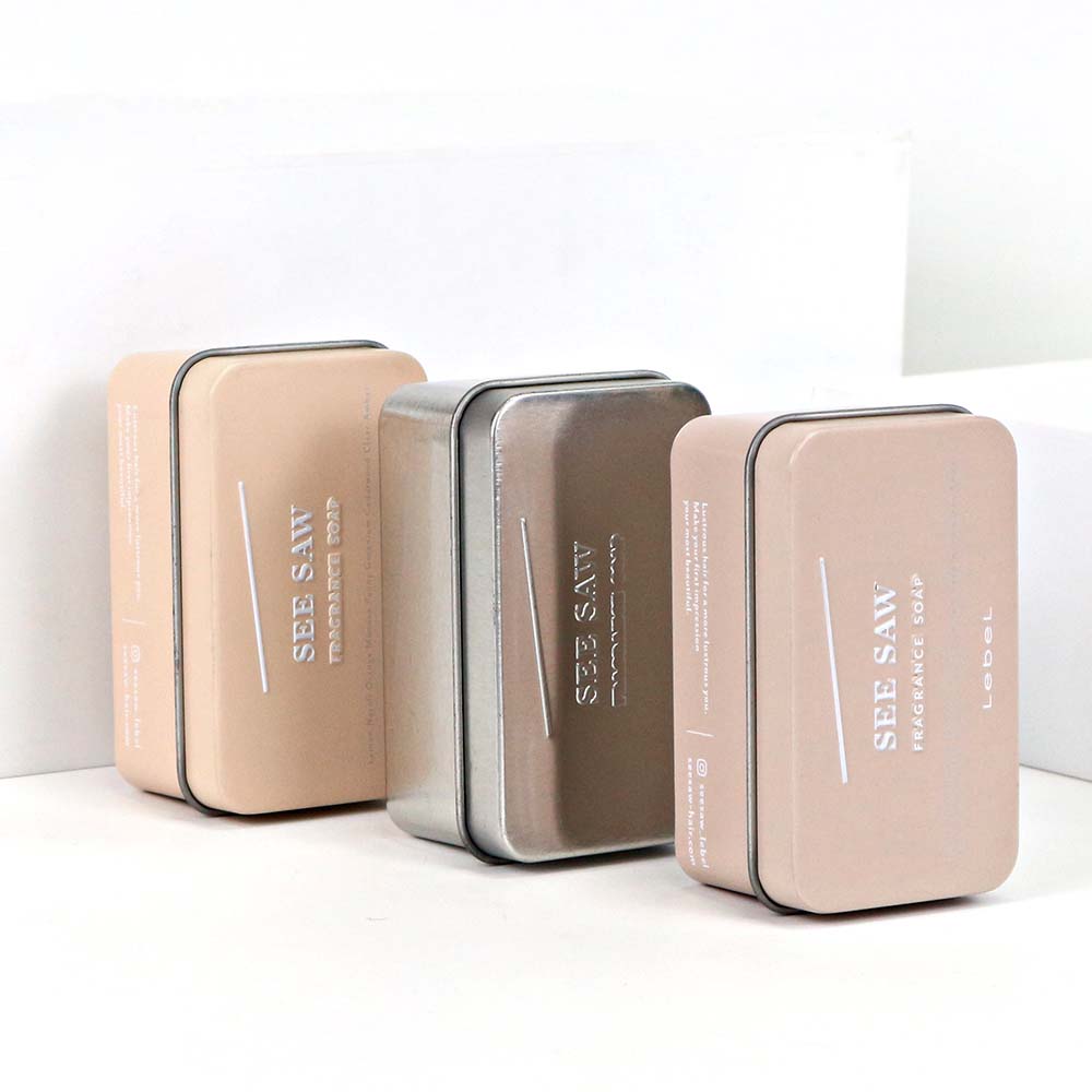 Opened rectangular metal fragrance soap tin container, showcasing its spacious interior for neatly storing soap bars or bath products.