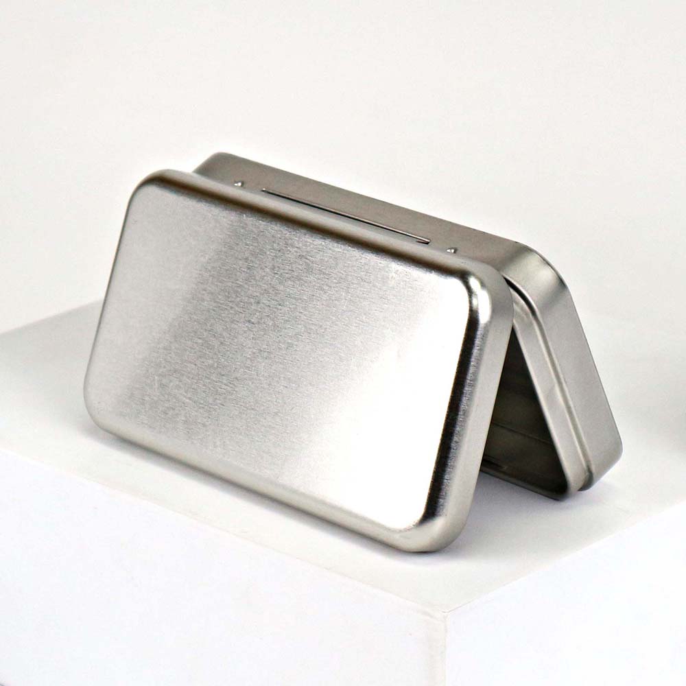 Custom-designed cosmetic tin box with a sturdy hinged lid, ideal for organizing beauty products and cosmetics.