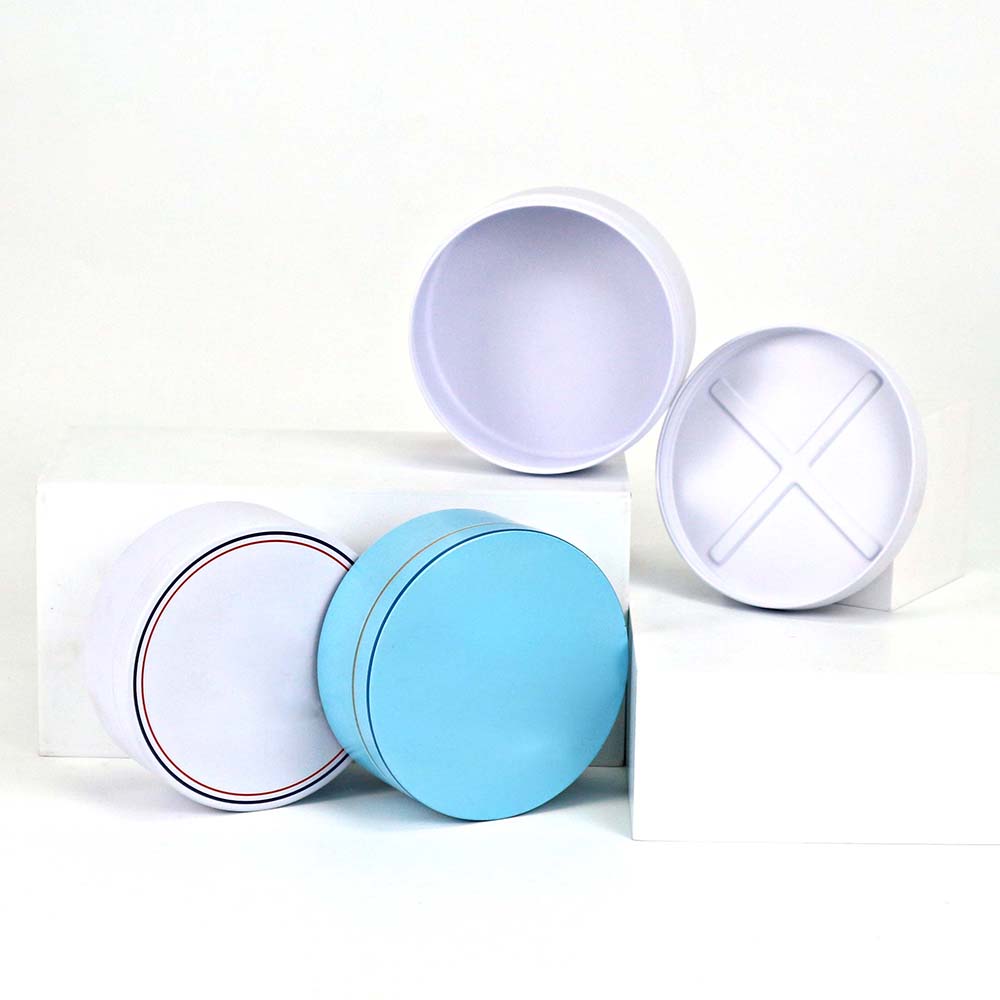 debossed cream tin container