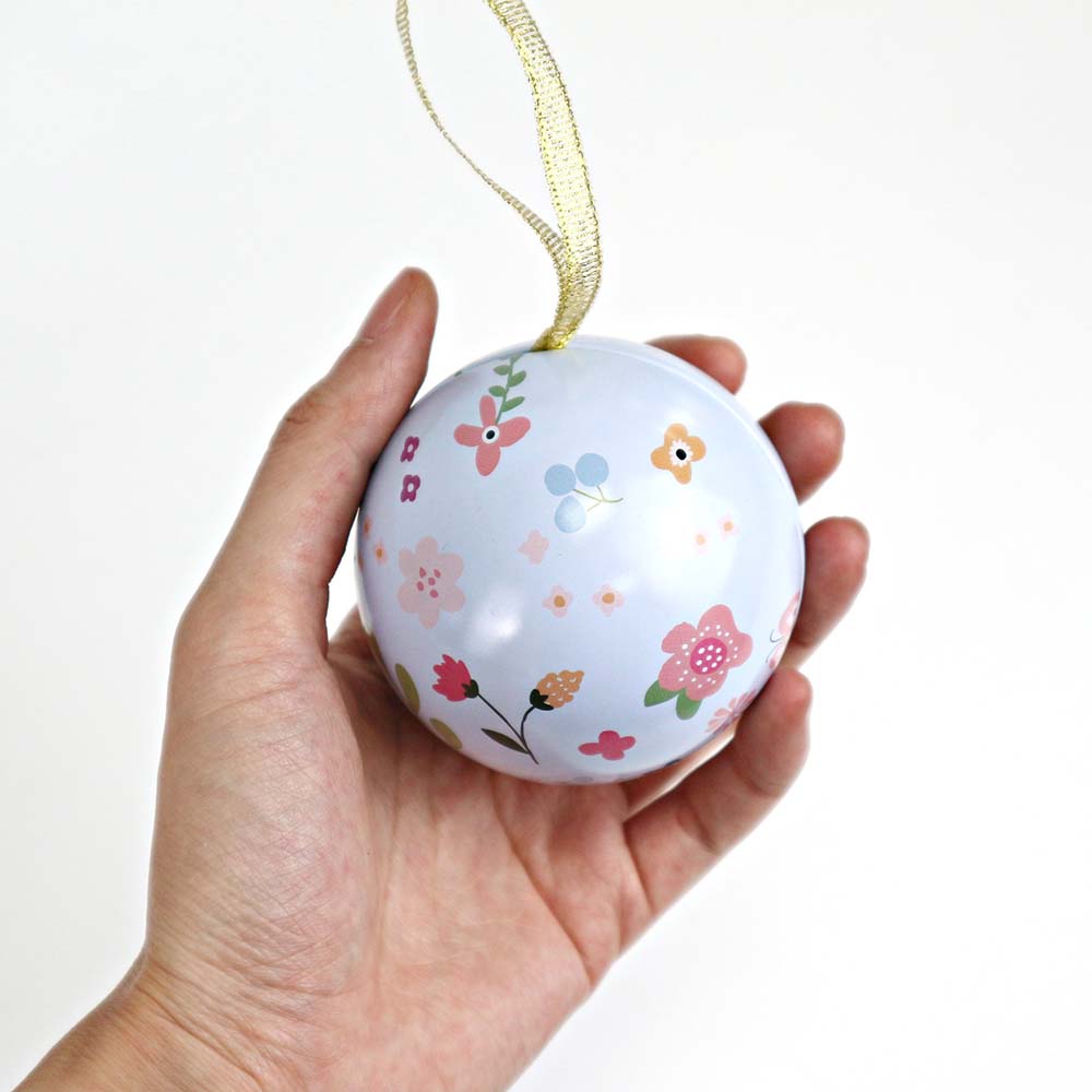 Ball shaped metal tins