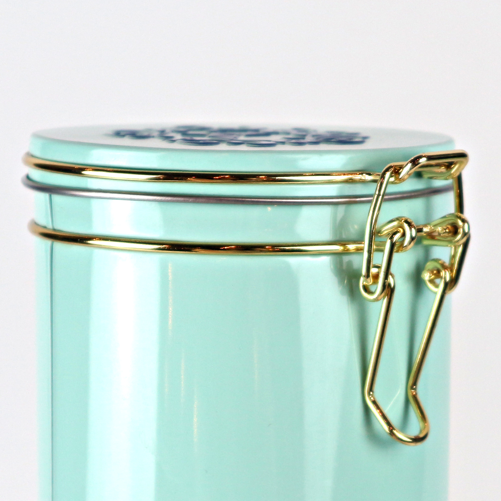 Decorative coffee tin with latch