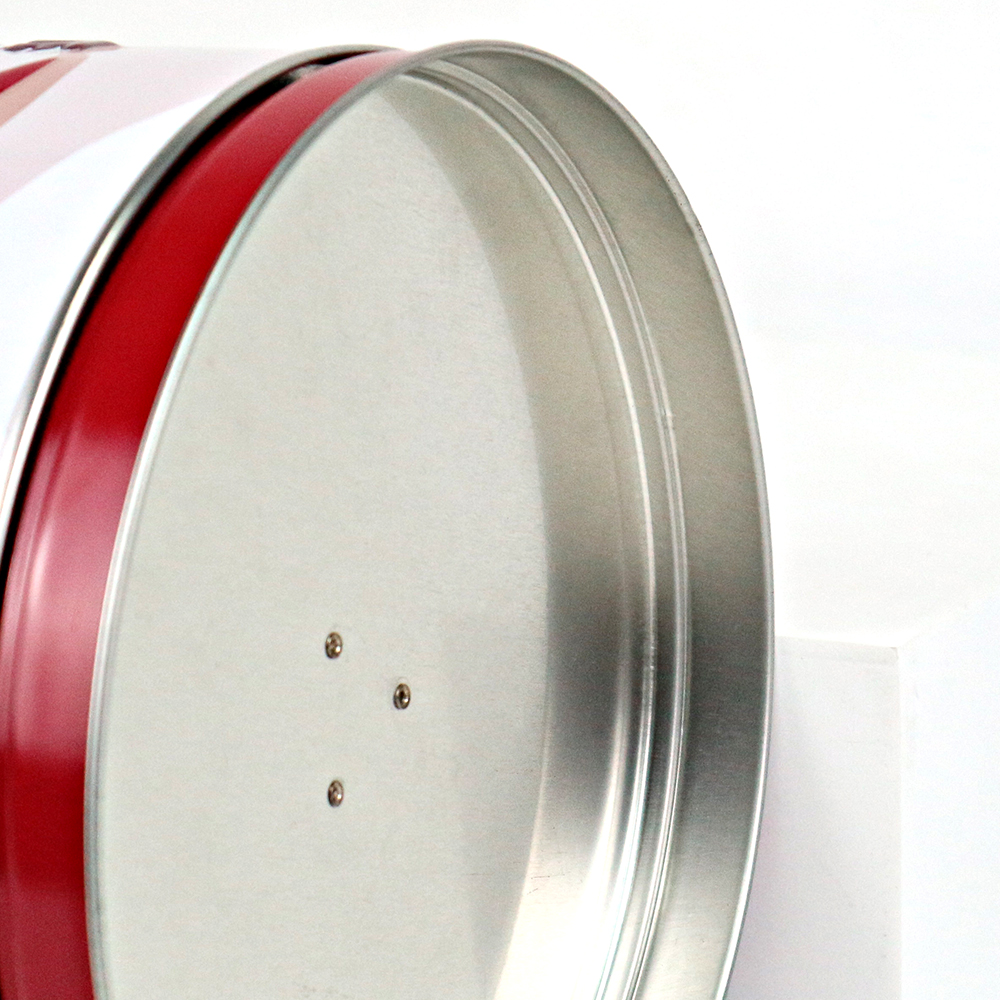 Festive rotating cookie tin