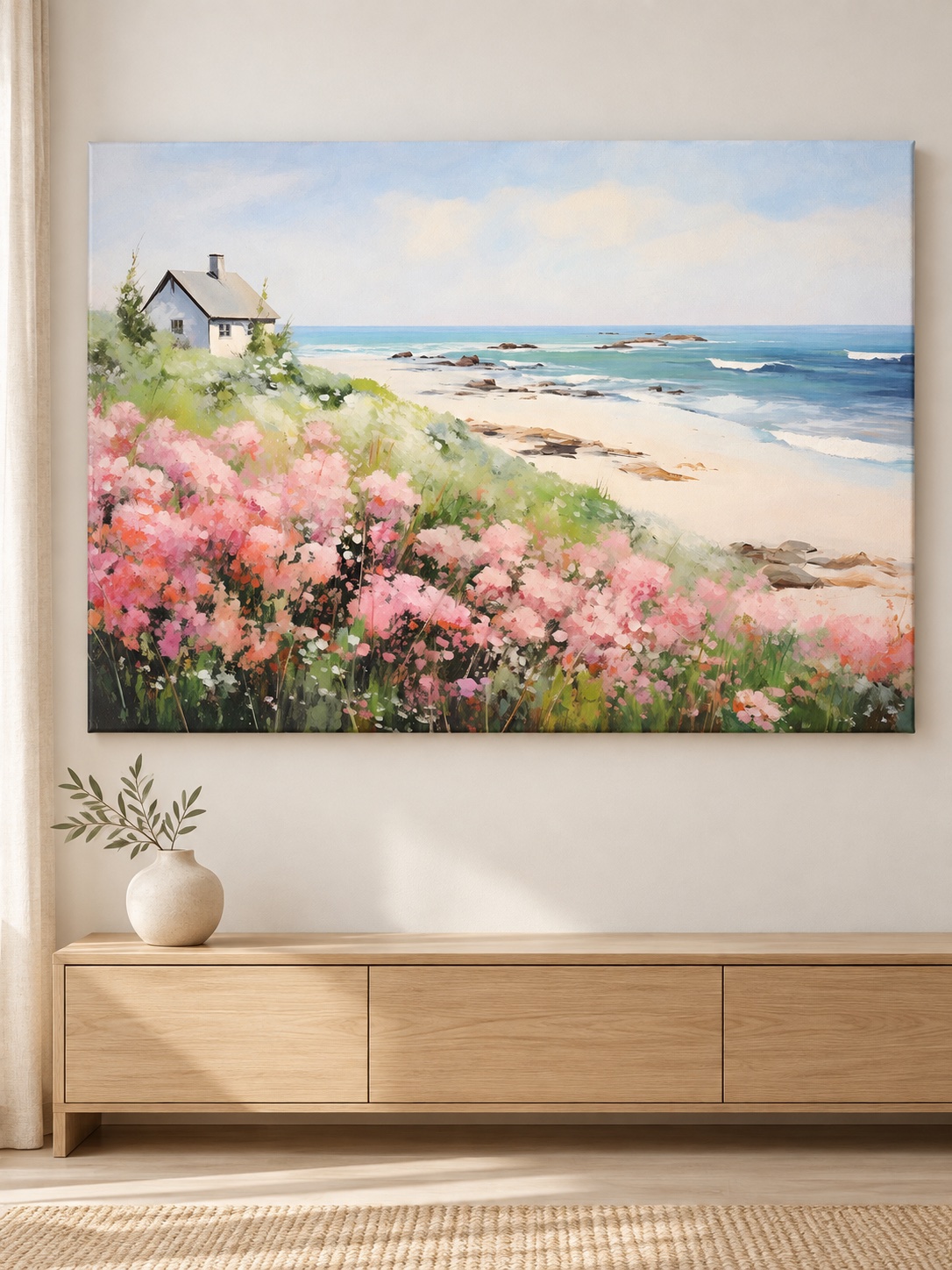 Breezy beach cottage canvas art with pink wildflowers by the sea