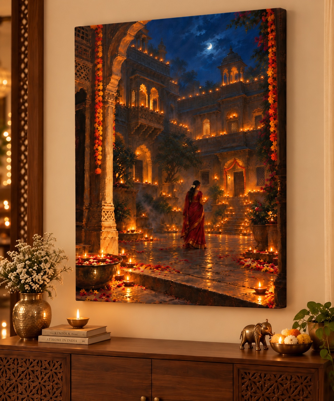 Woman in a red saree holding a diya in an ornate moonlit Indian courtyard filled with glowing lamps, marigold garlands, flower petals, and carved architecture.