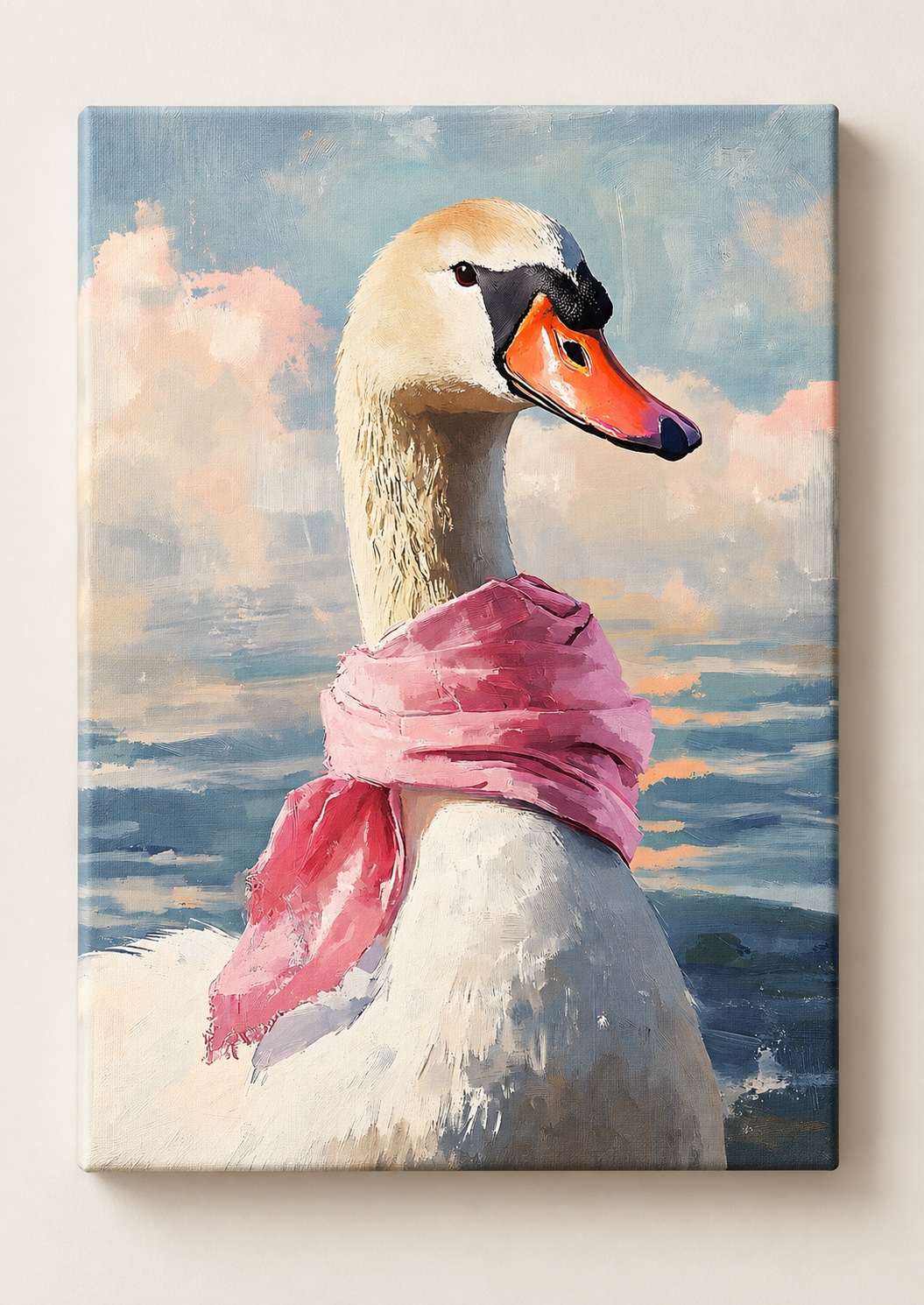 White swan with a black face marking, orange beak, and pink scarf against blue water and a pastel sky.