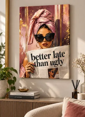 Stylish woman wearing a pink turban, oversized black cat-eye sunglasses, gold hoop earrings, and red lipstick while holding a newspaper reading “better late than ugly.”