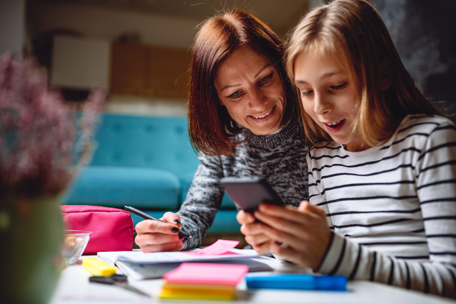 Mom Helping Daughter with Homework