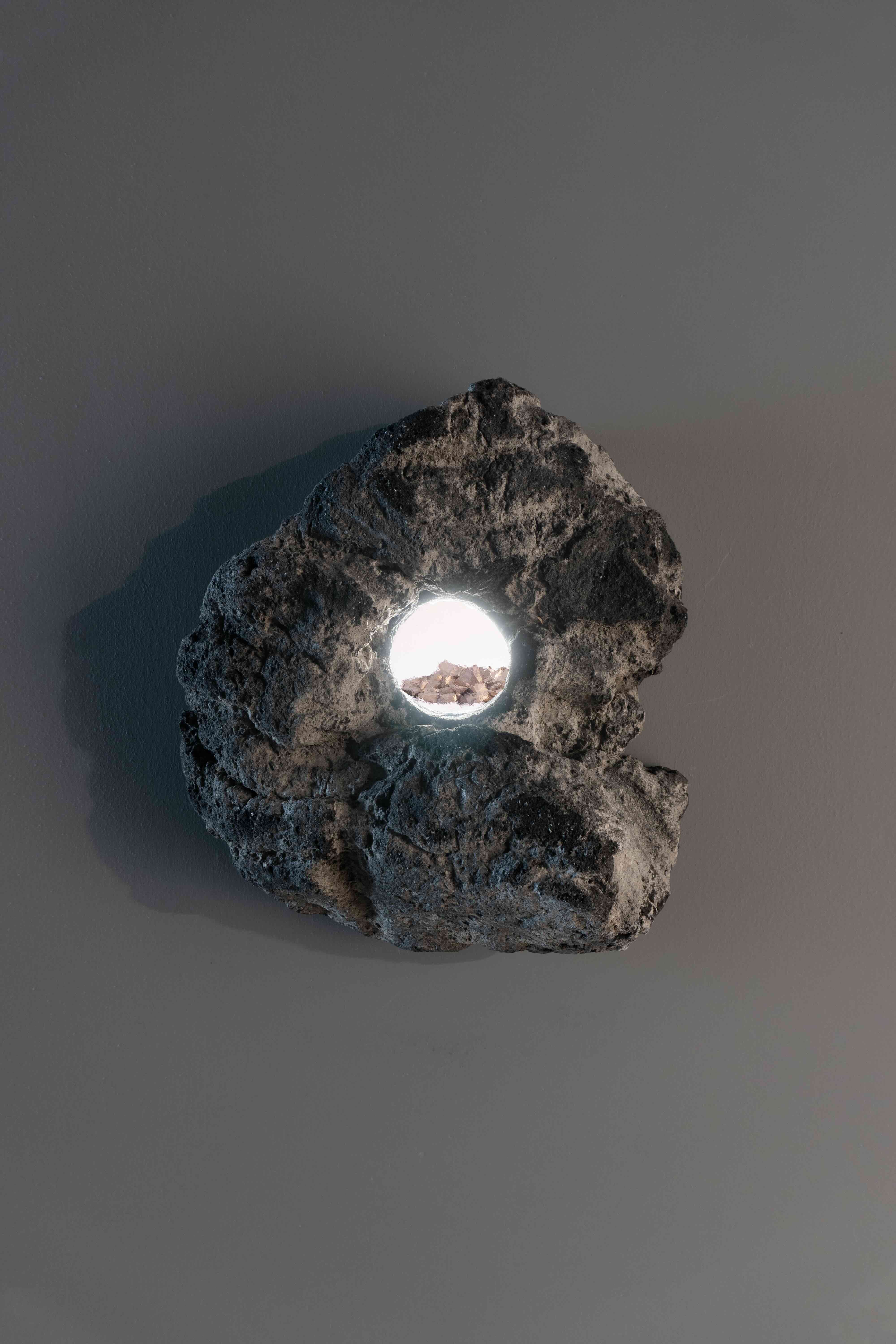 Cynthia Gutiérrez, "Expansion Cartography", 2020–26. Volcanic rock, transparent glass, and bronze. Courtesy of CURRO.
