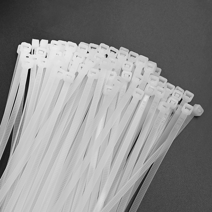 Qoltec Opaski zaciskowe Trytki kablowe | 4.8*200mm | 100 szt. | Nylon66 | UV | Białe - zdjęcie 3