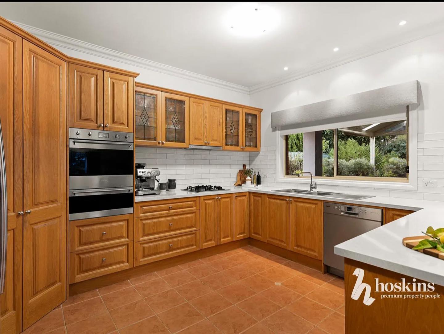 Wooden kitchen cabinets with natural finish