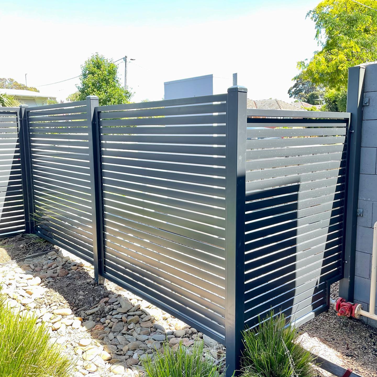 Horizontal slat fence panels aligned perfectly