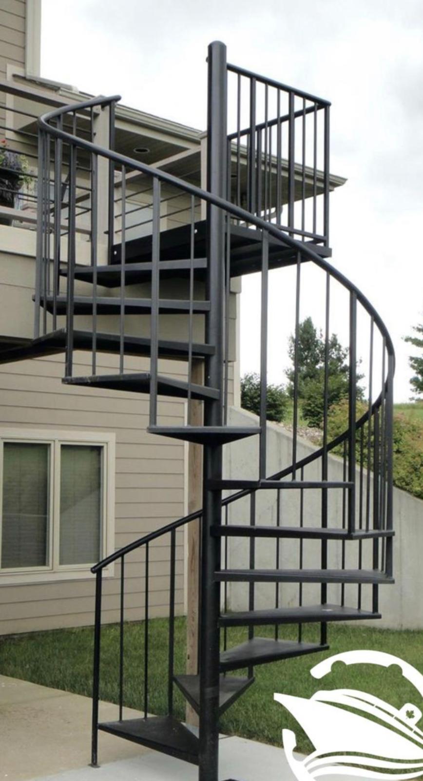Completed custom spiral staircase installed at residence