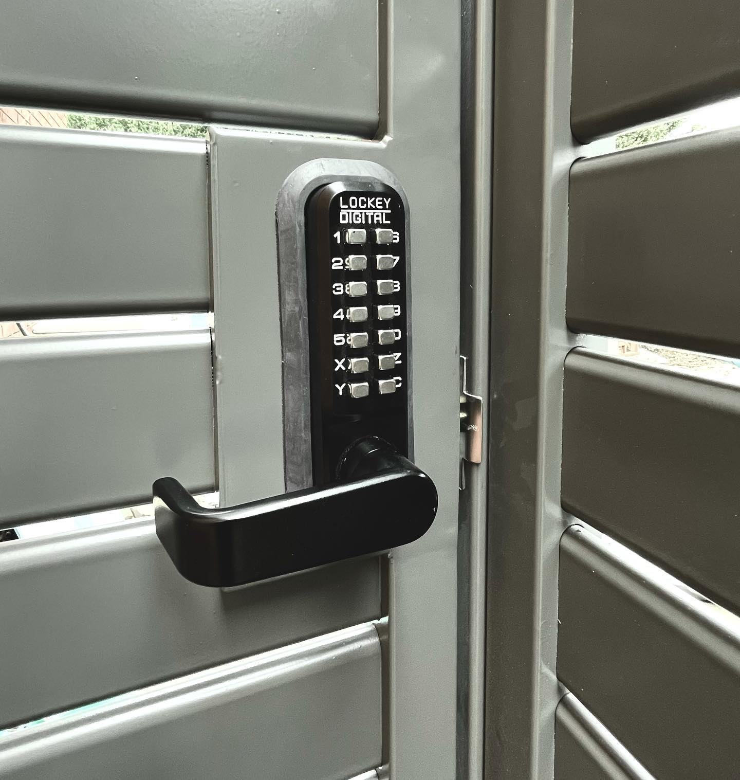 Slat fence gate with digital lock system