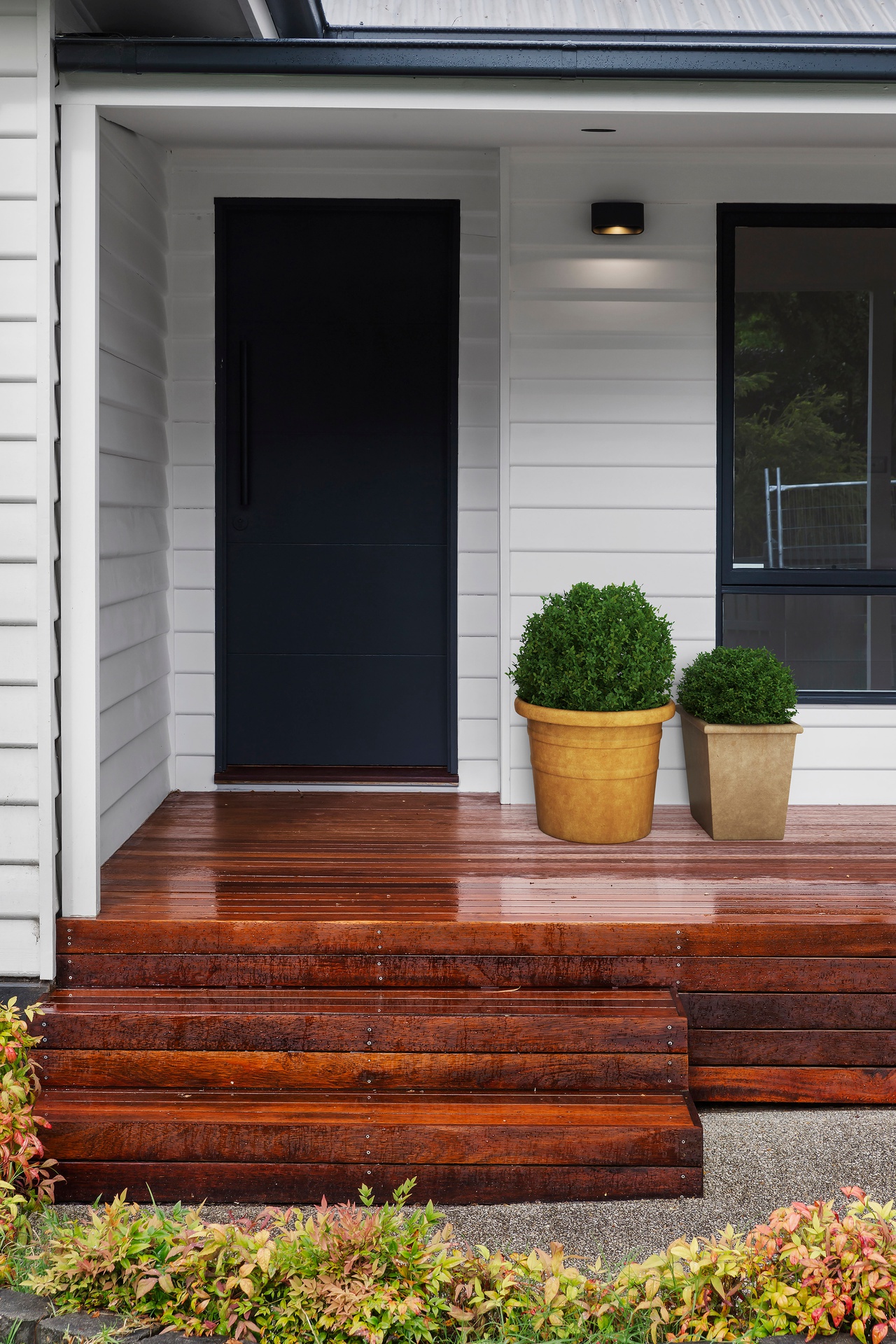 Front entrance leading onto wooden deck