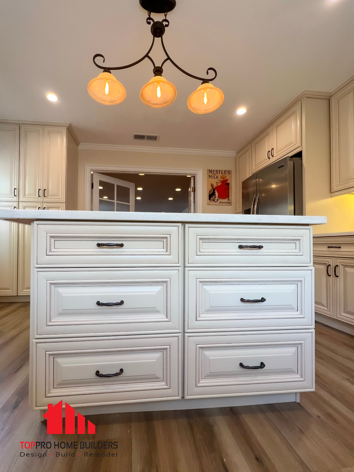 Kitchen island with decorative light fixture