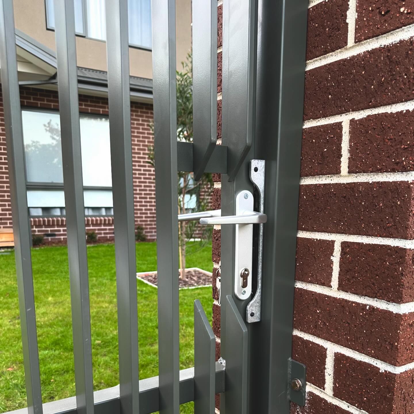 Beautiful Woodland Grey Blade Style Package in Diamond Creek 5 Grey metal pedestrian swing gate with vertical blades