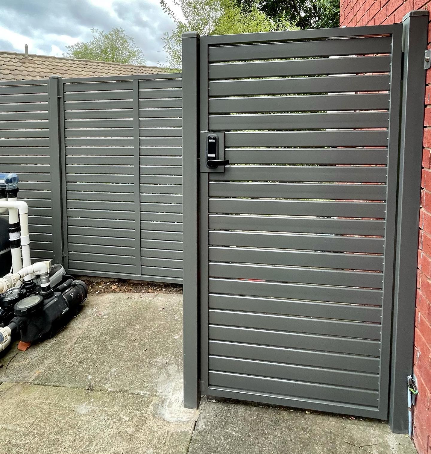 Eltham Steel Fencing: Security and Privacy with Style 4 Digital keypad installed on gate for secure access