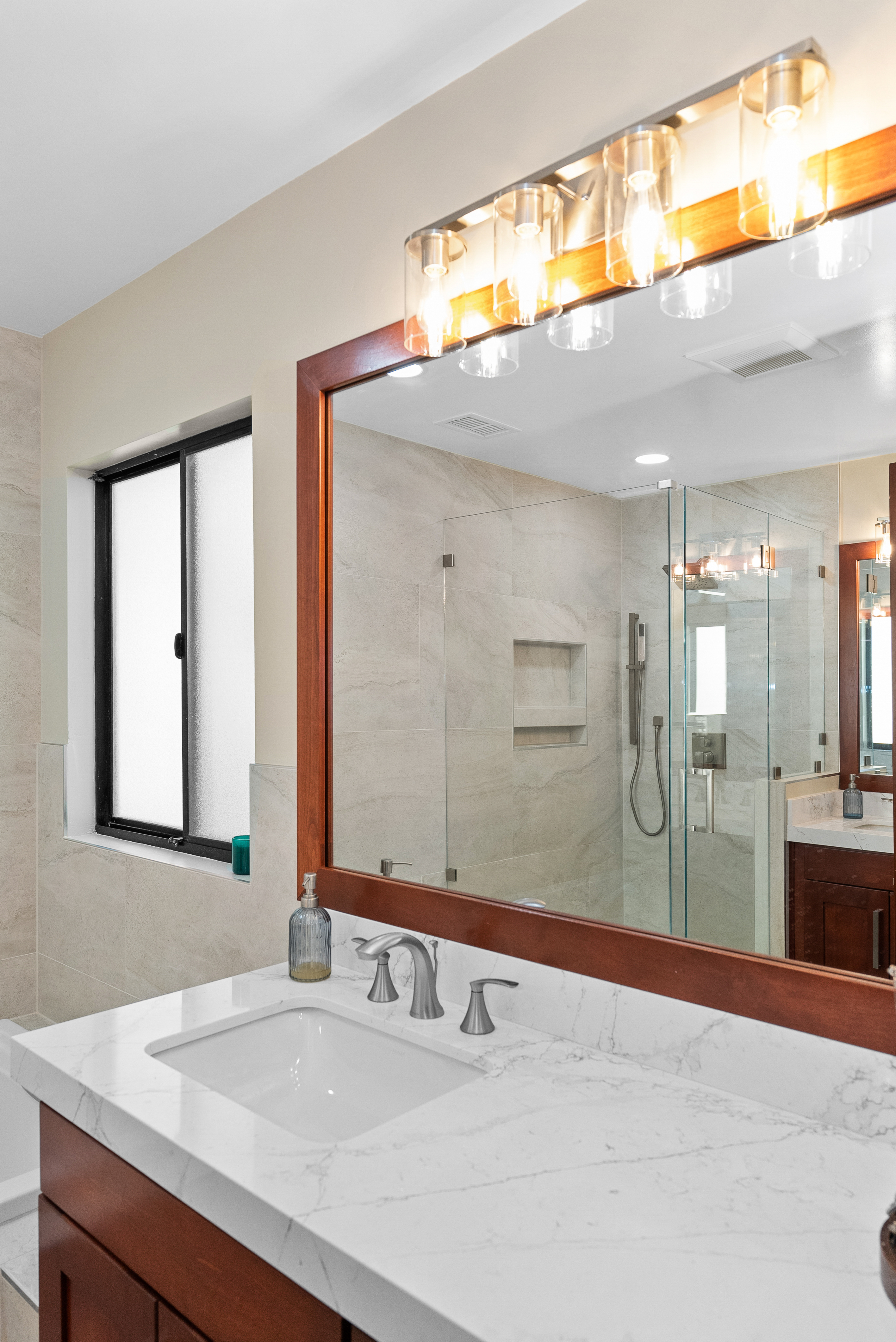 Modern bathroom vanity with white marble countertop