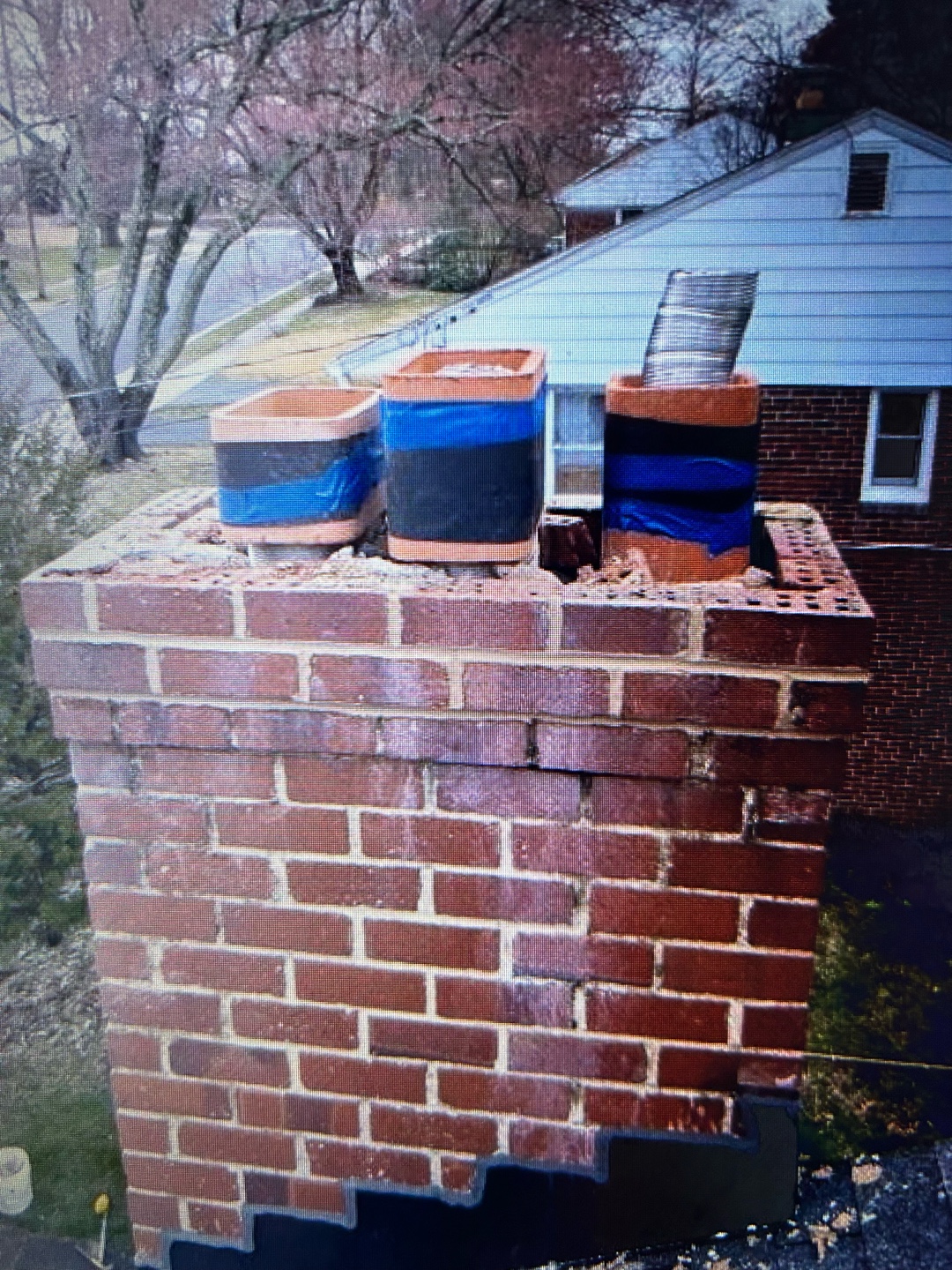 Chimney Pots Under Repair