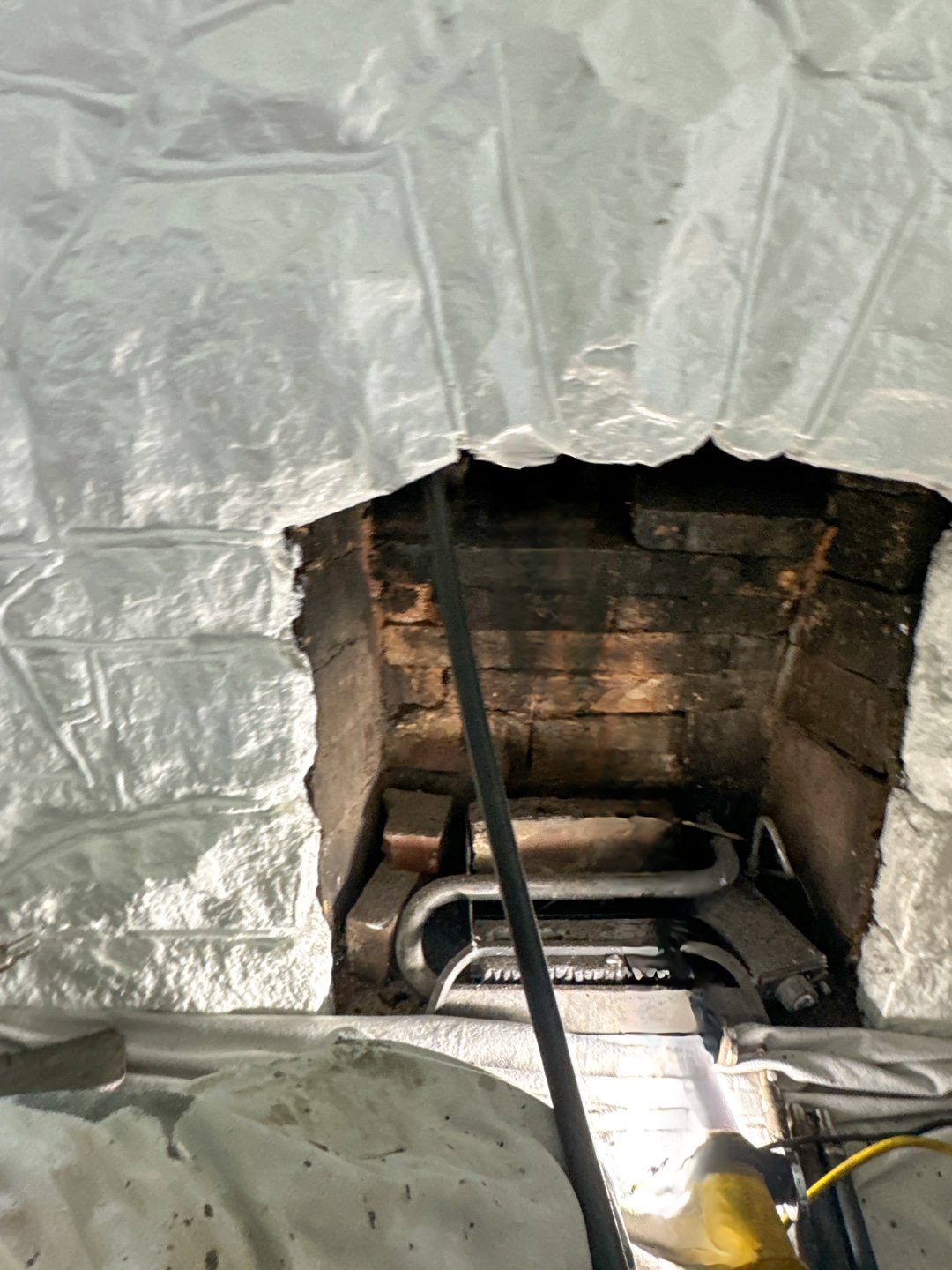 Interior view of fireplace during work