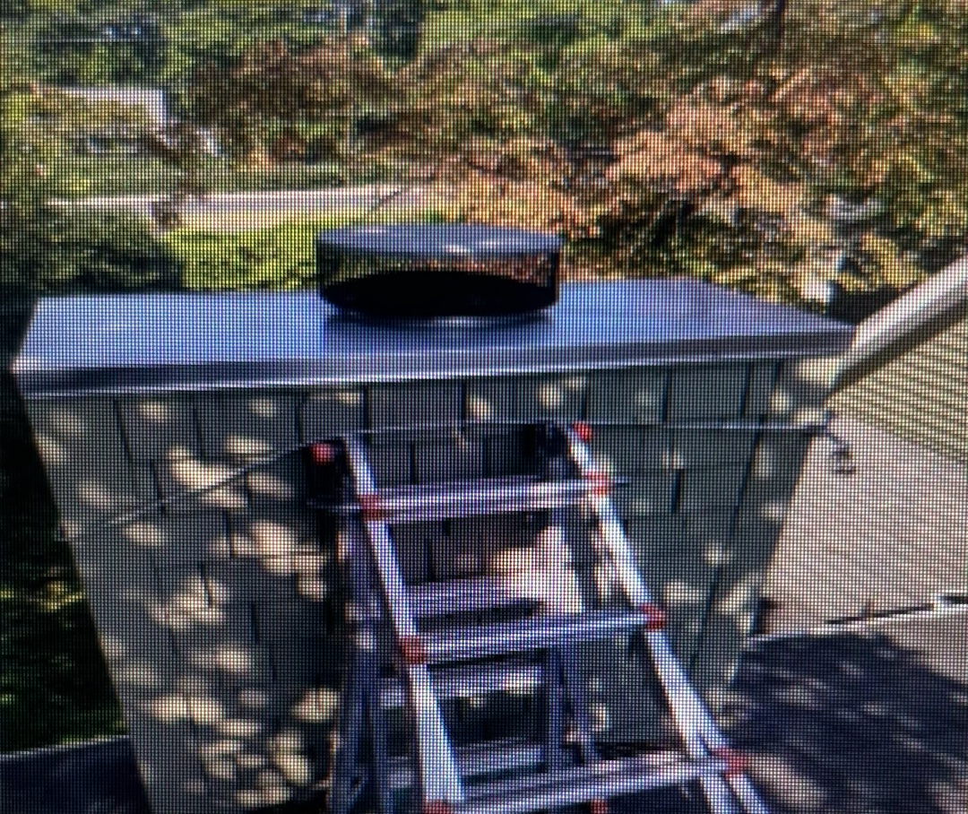 Team working on chimney installation