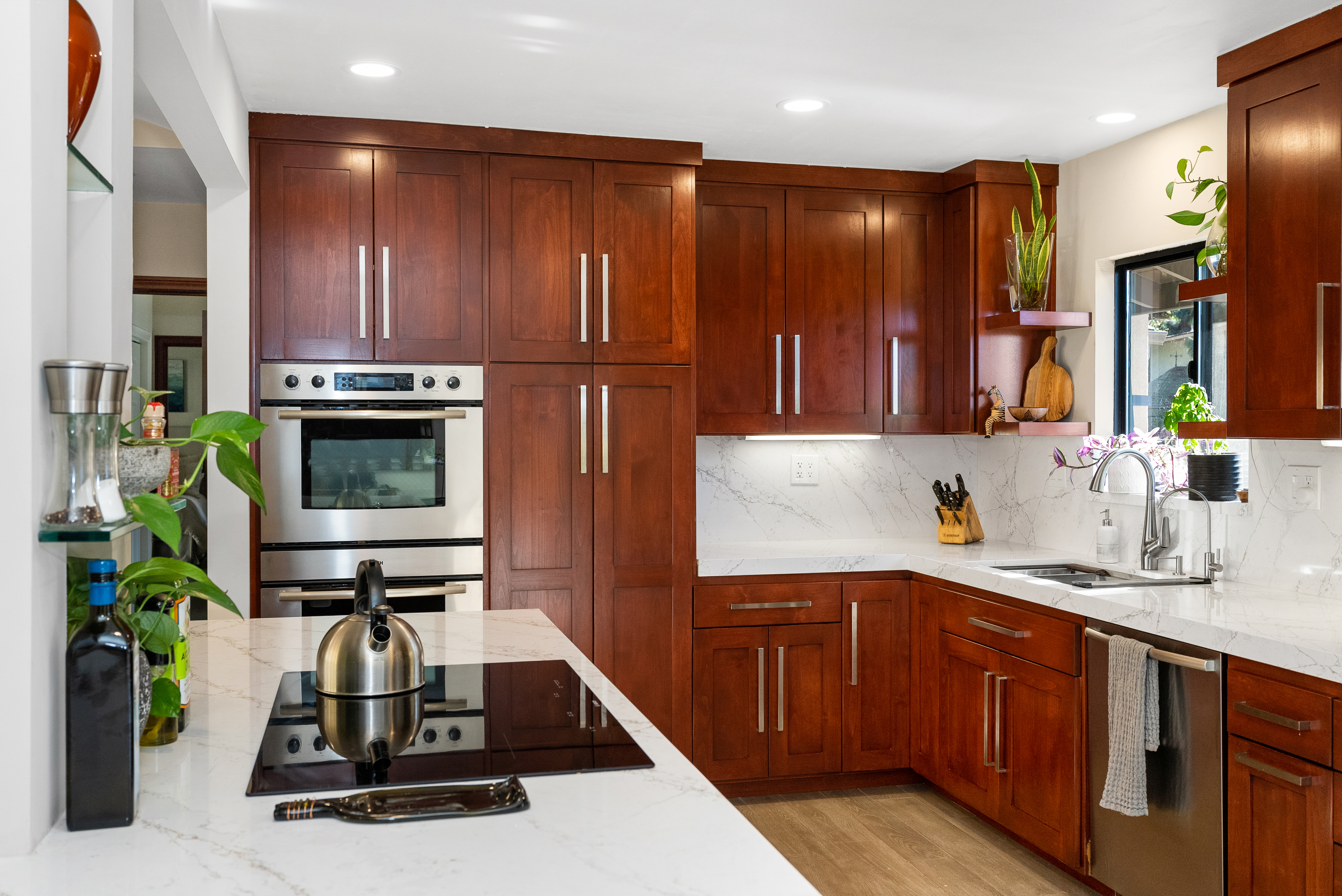 Modern kitchen with white marble countertops