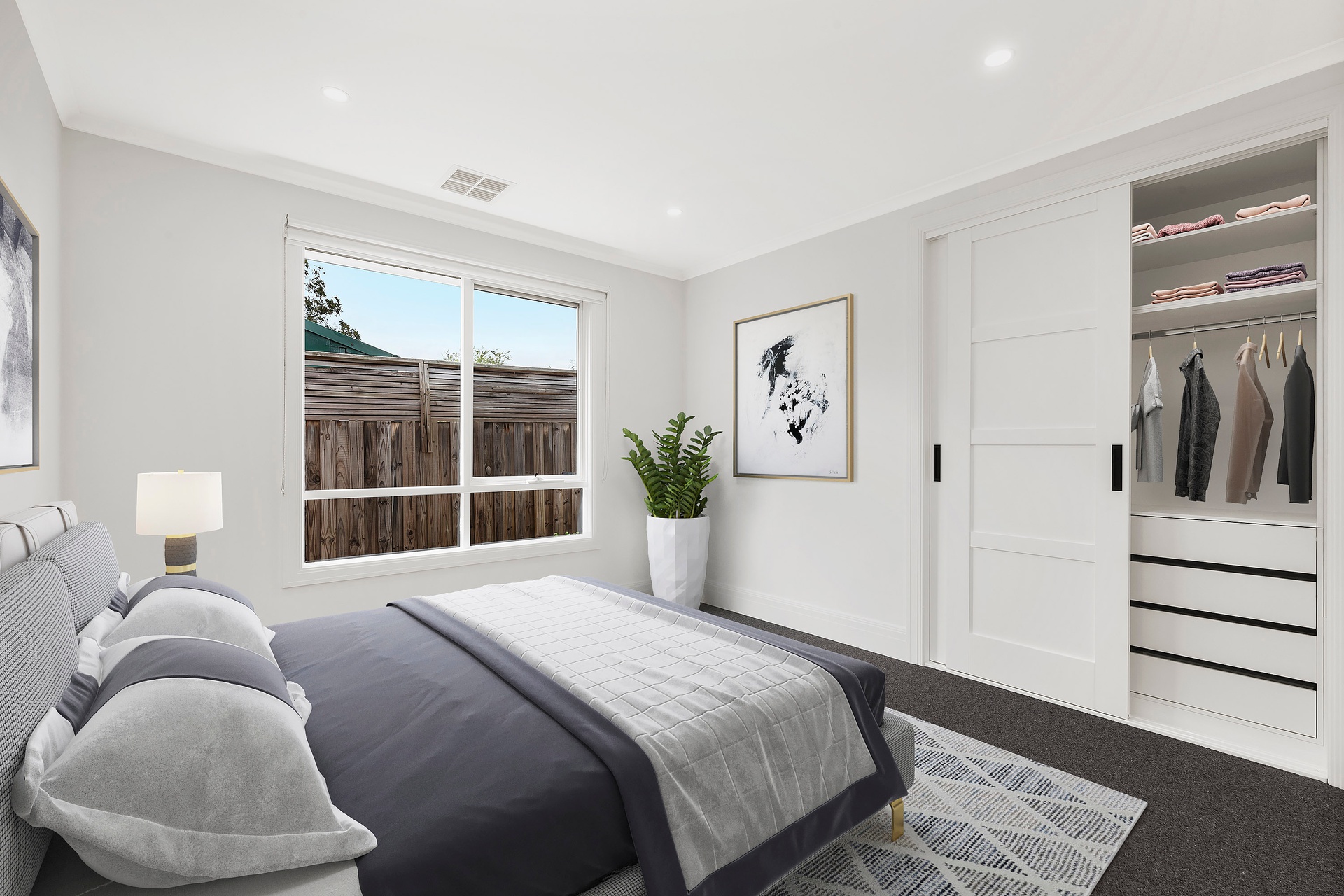 Spacious bedroom filled with natural light