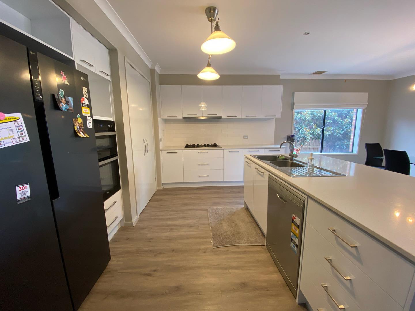 Stainless steel sink on large kitchen island