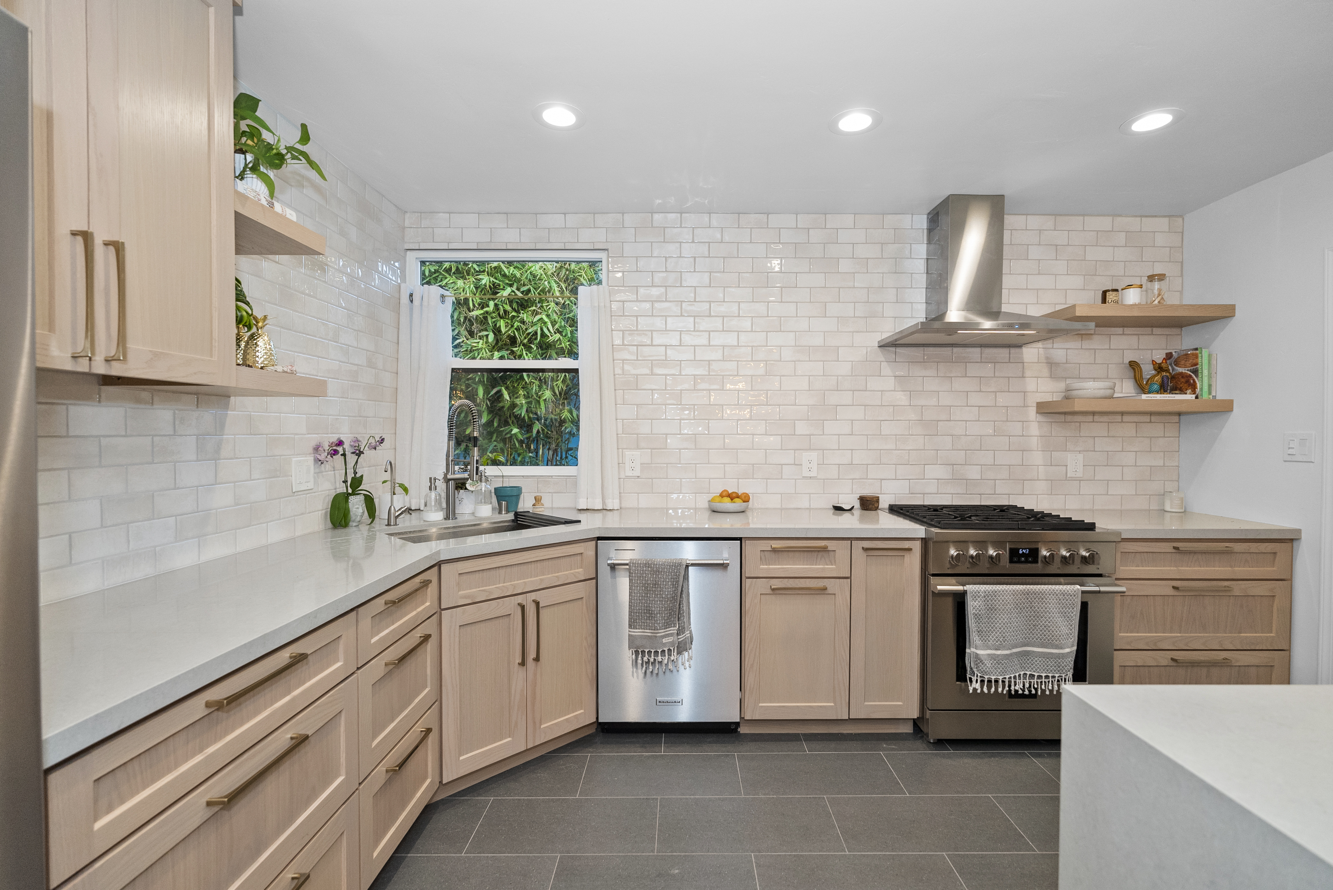 Recessed lighting illuminating a modern kitchen