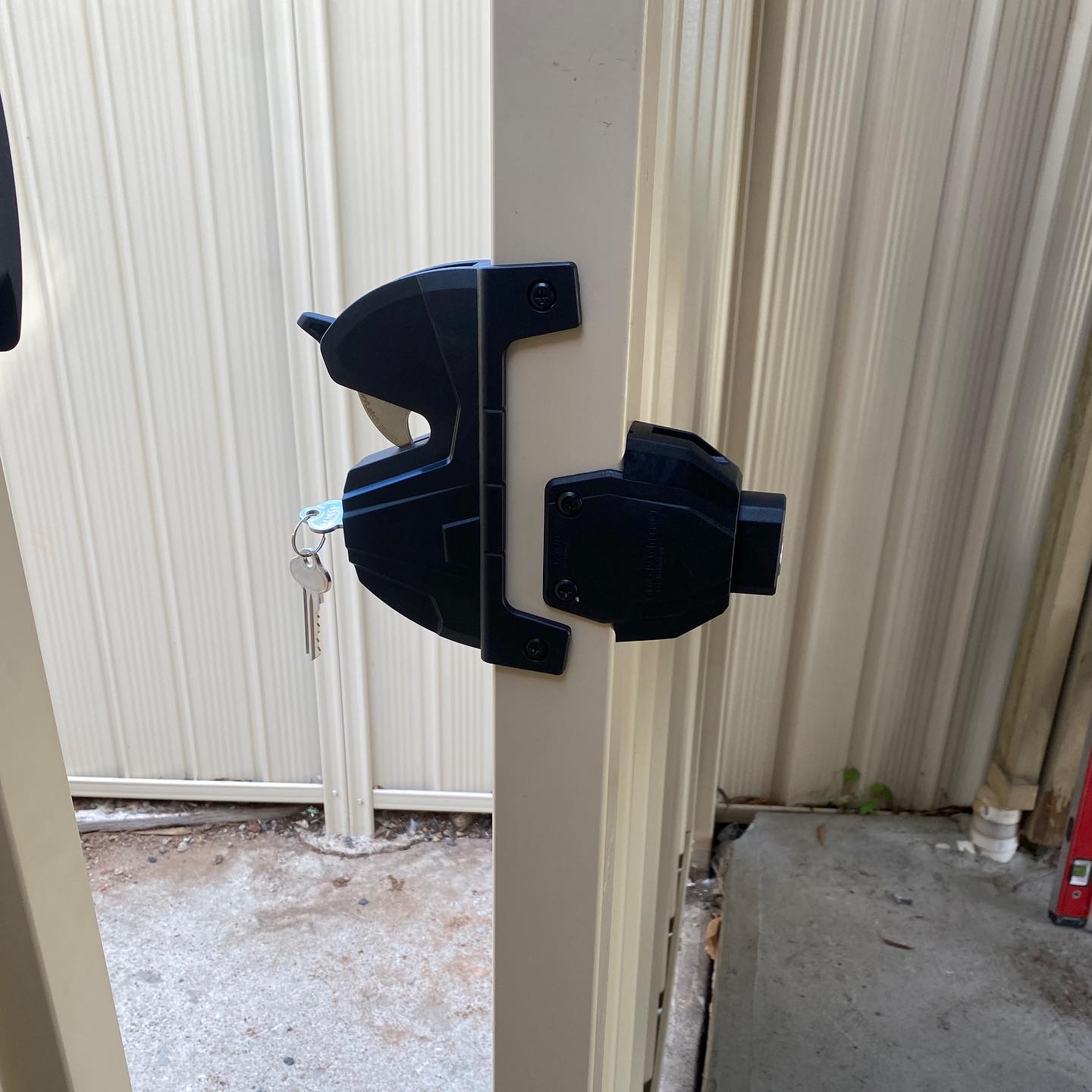 Exceptional Swing Gates Installation in Meadow Heights 2 Close-up of Colorbond steel double gate with @ddtechglobal lock