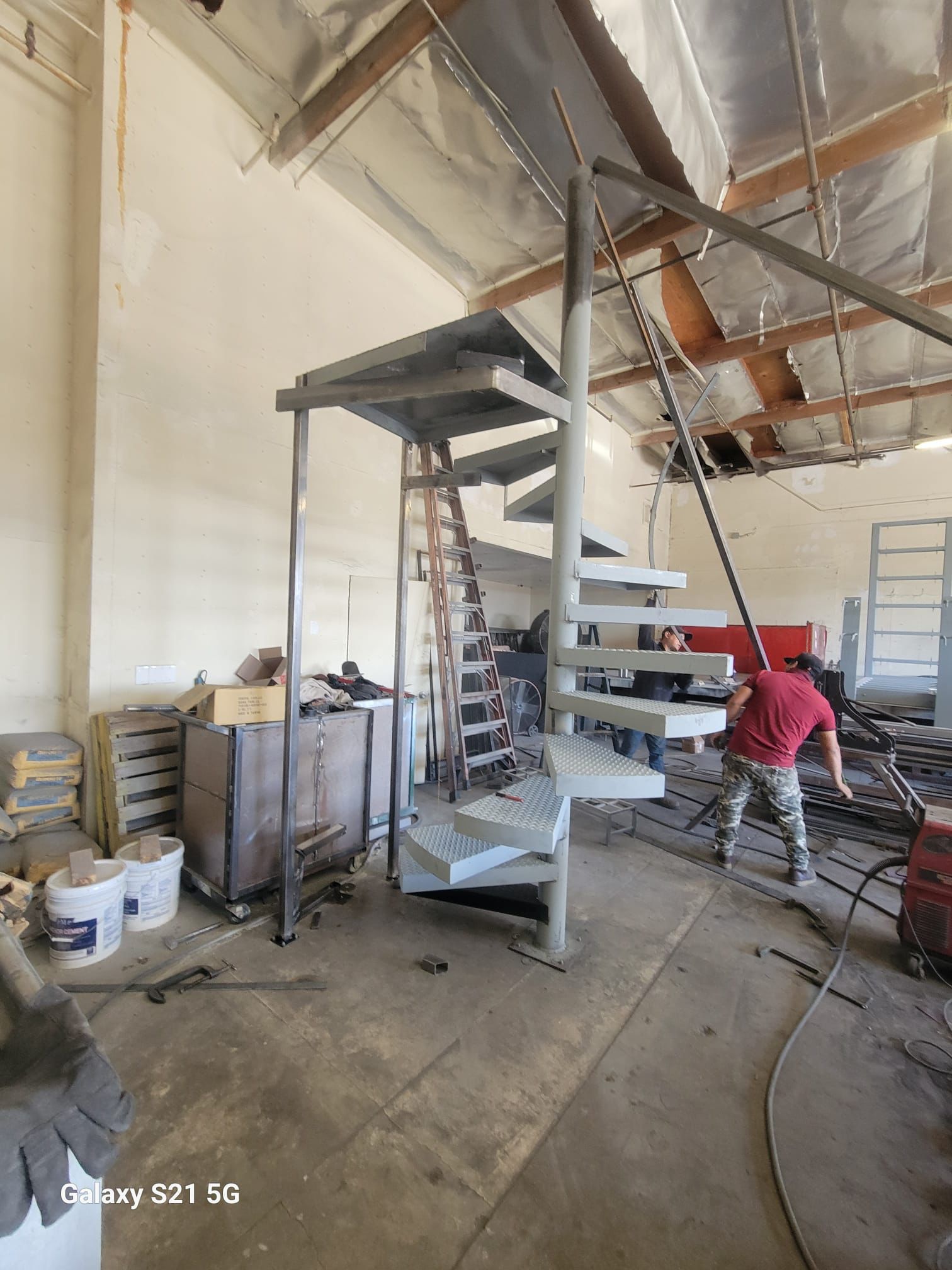 In-progress construction of custom spiral staircase