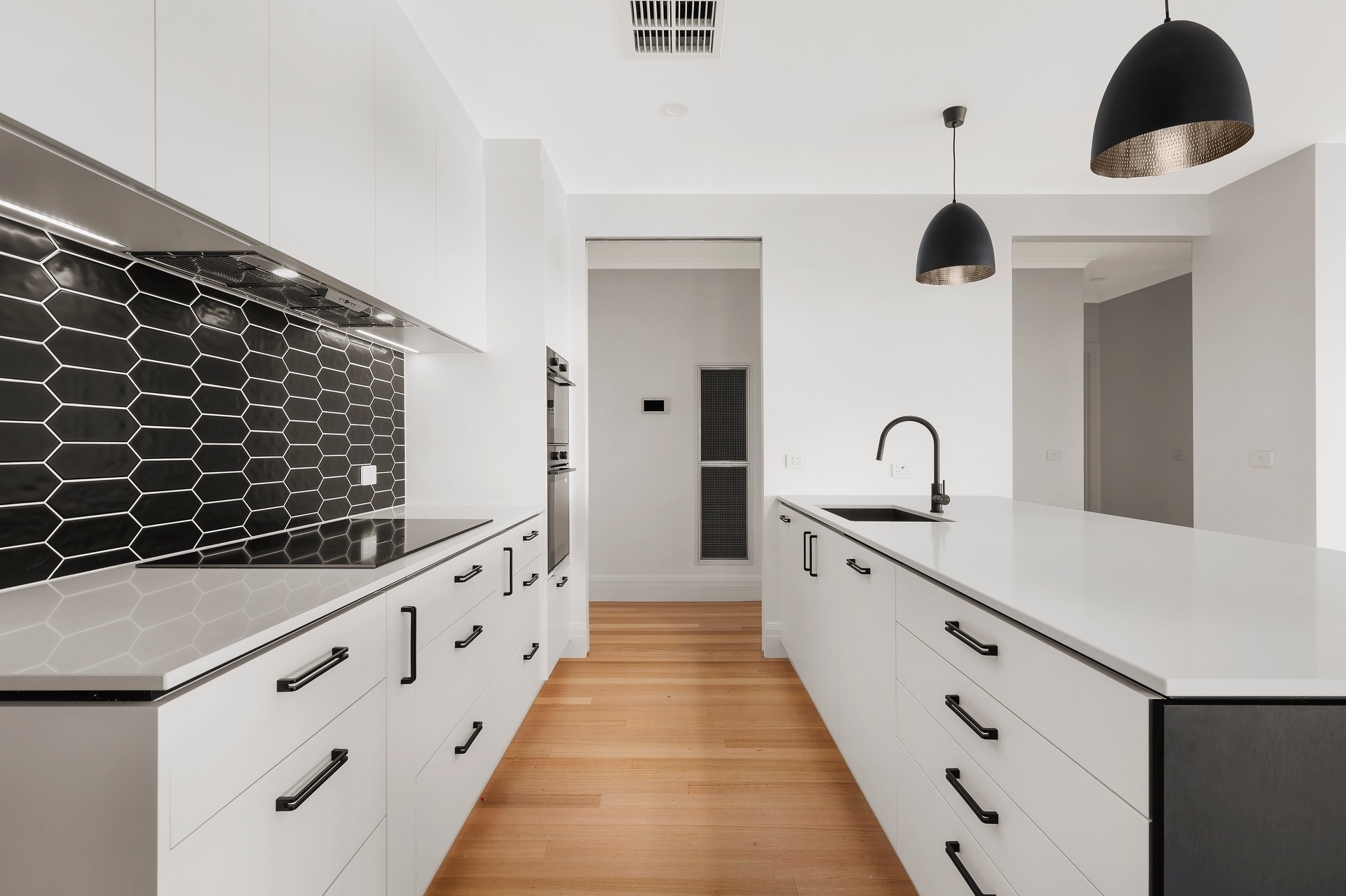 Modern kitchen with white cabinetry
