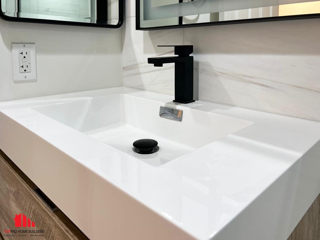 Modern sink area with black faucet