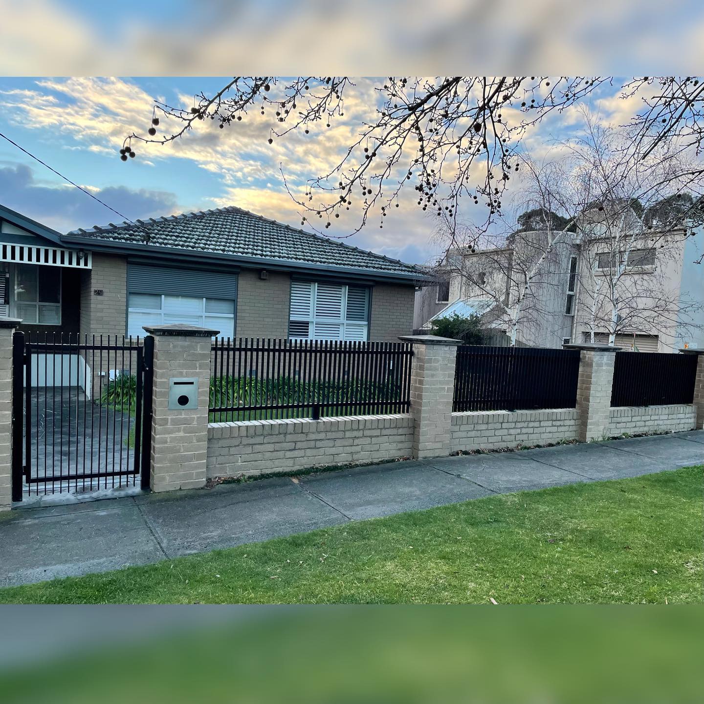 Residential property with auto slider gate and pedestrian gate