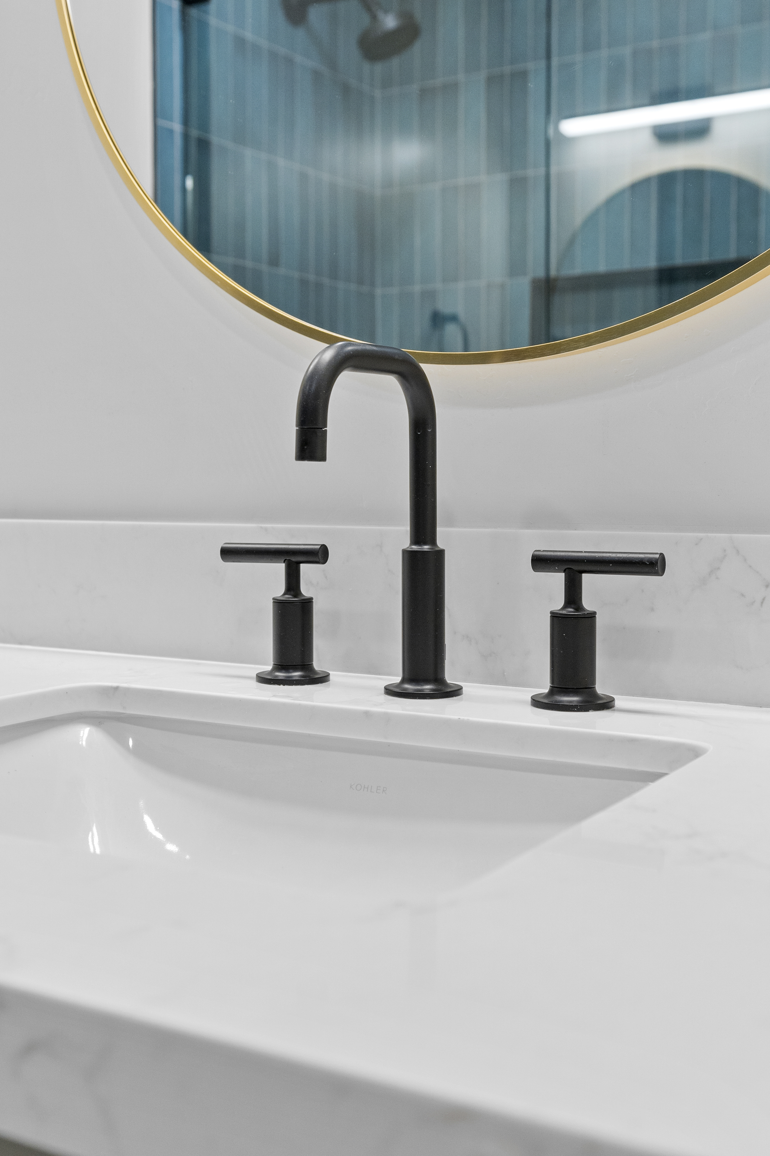 Modern bathroom sink with matte black faucet