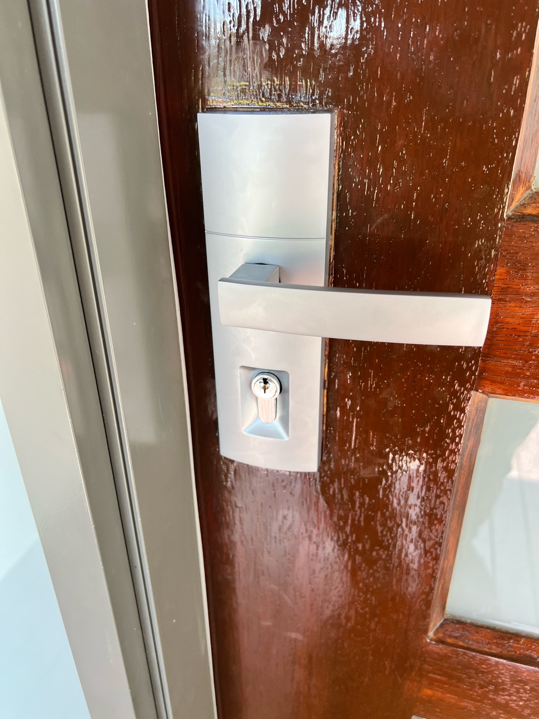 Newly installed Gainsborough trilock on wooden door