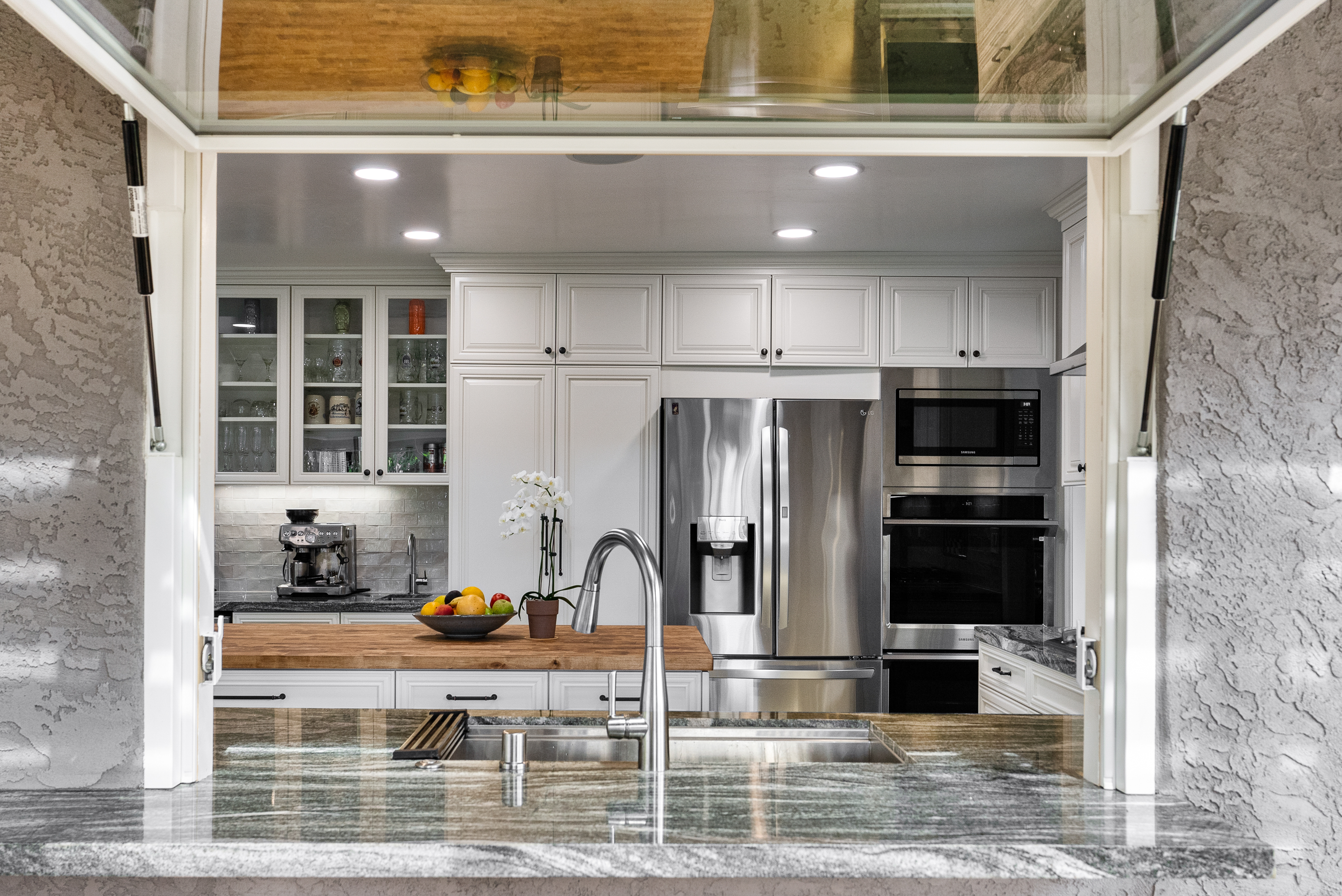 Stainless steel appliances in modern kitchen